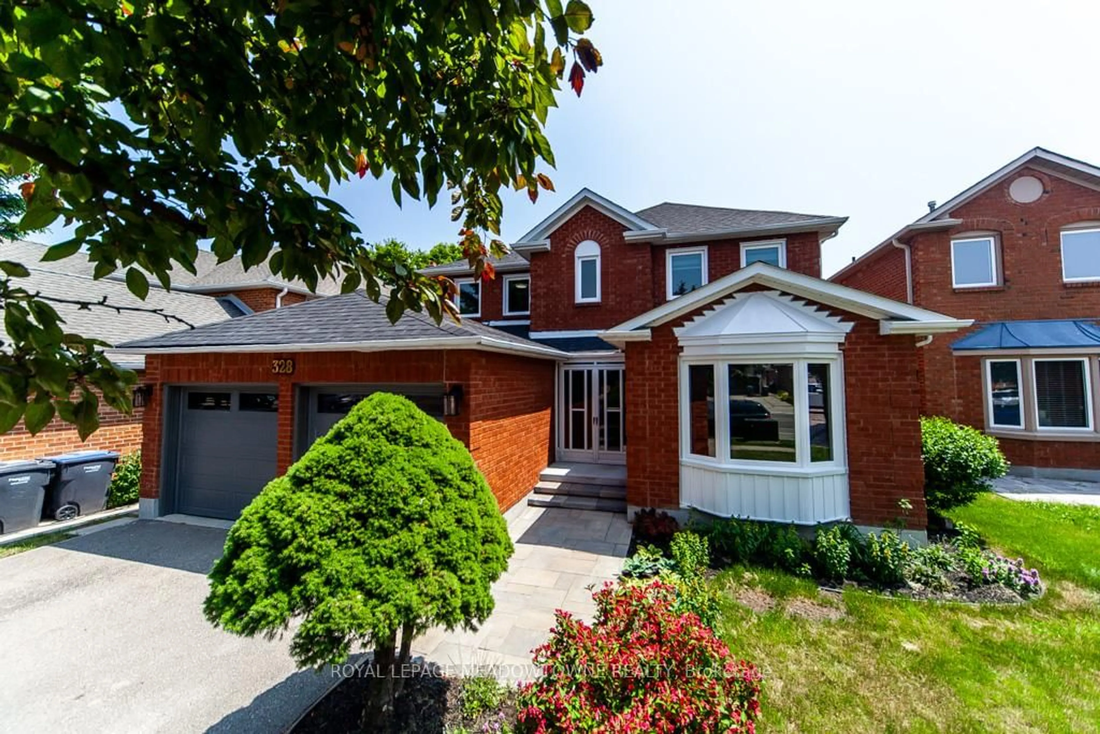 Home with brick exterior material, street for 328 Bristol Rd, Mississauga Ontario L5R 2J7
