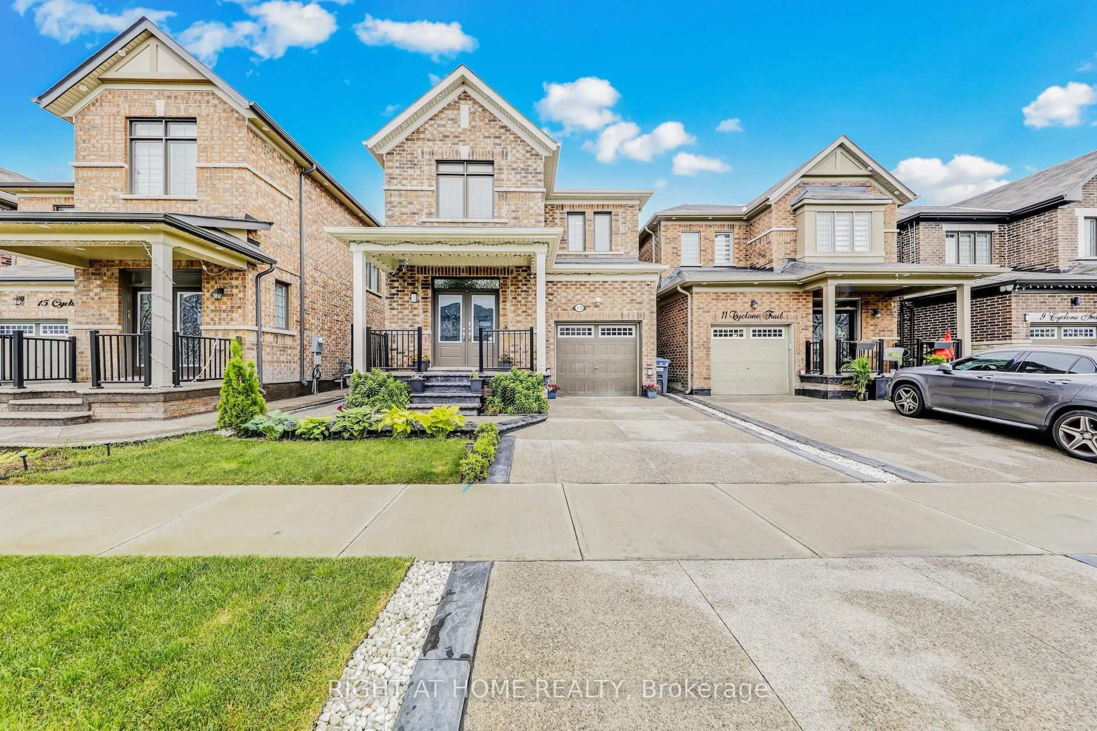 Home with brick exterior material, street for 13 Cyclone Tr, Brampton Ontario L7A 5E8