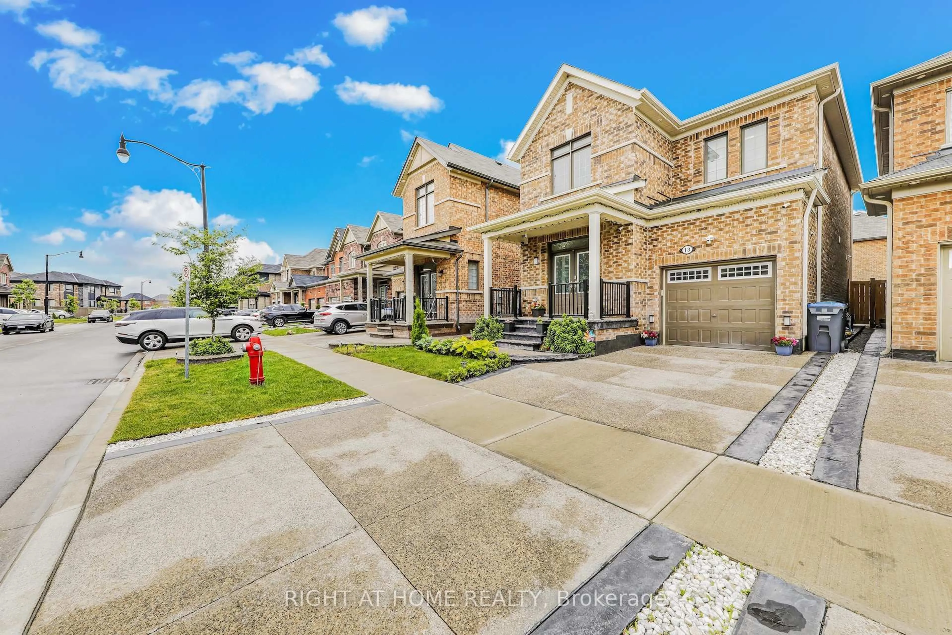Home with brick exterior material, street for 13 Cyclone Tr, Brampton Ontario L7A 5E8