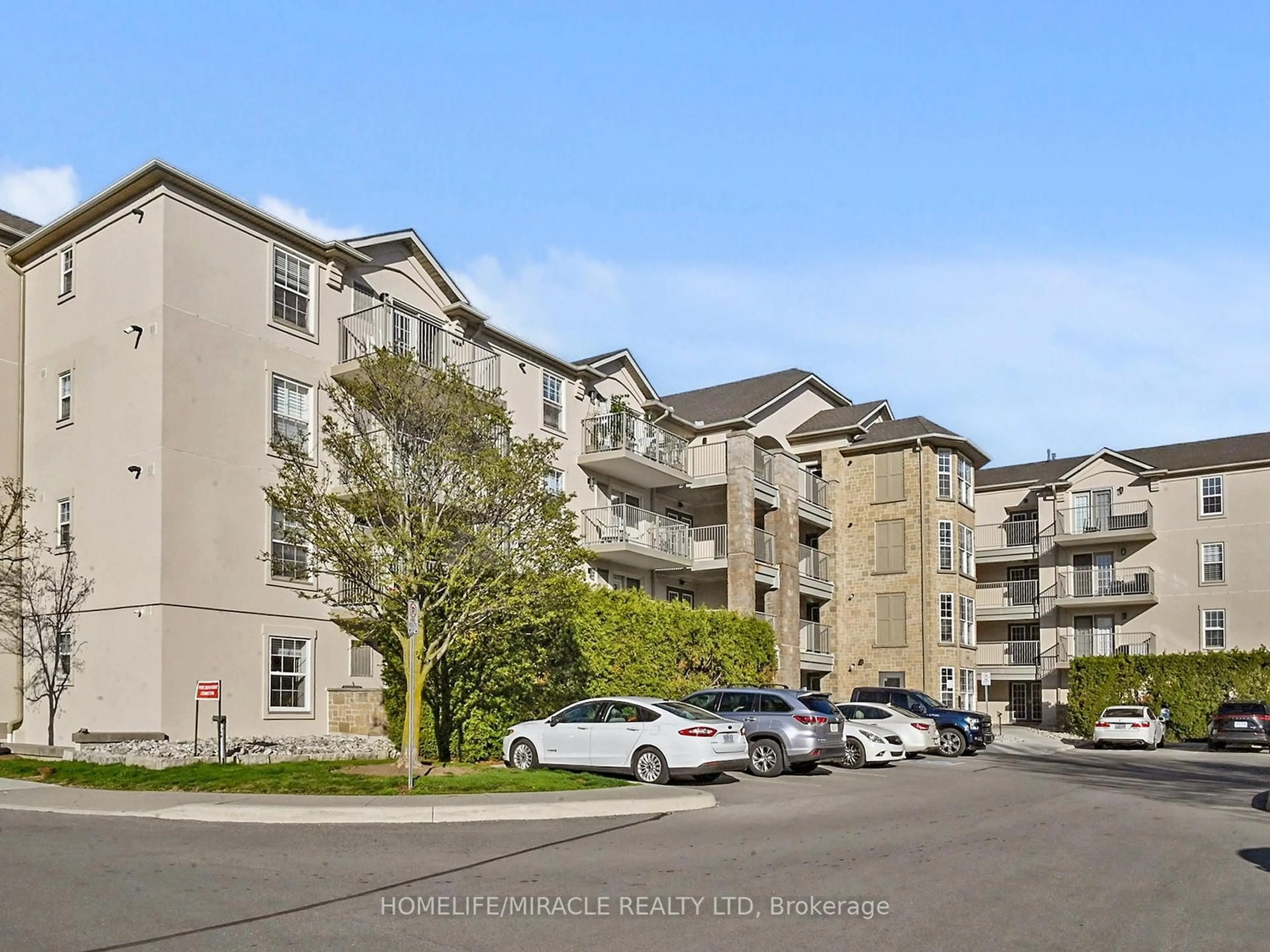 A pic from outside/outdoor area/front of a property/back of a property/a pic from drone, unknown for 1440 Bishops Gate #306, Oakville Ontario L6M 4M9