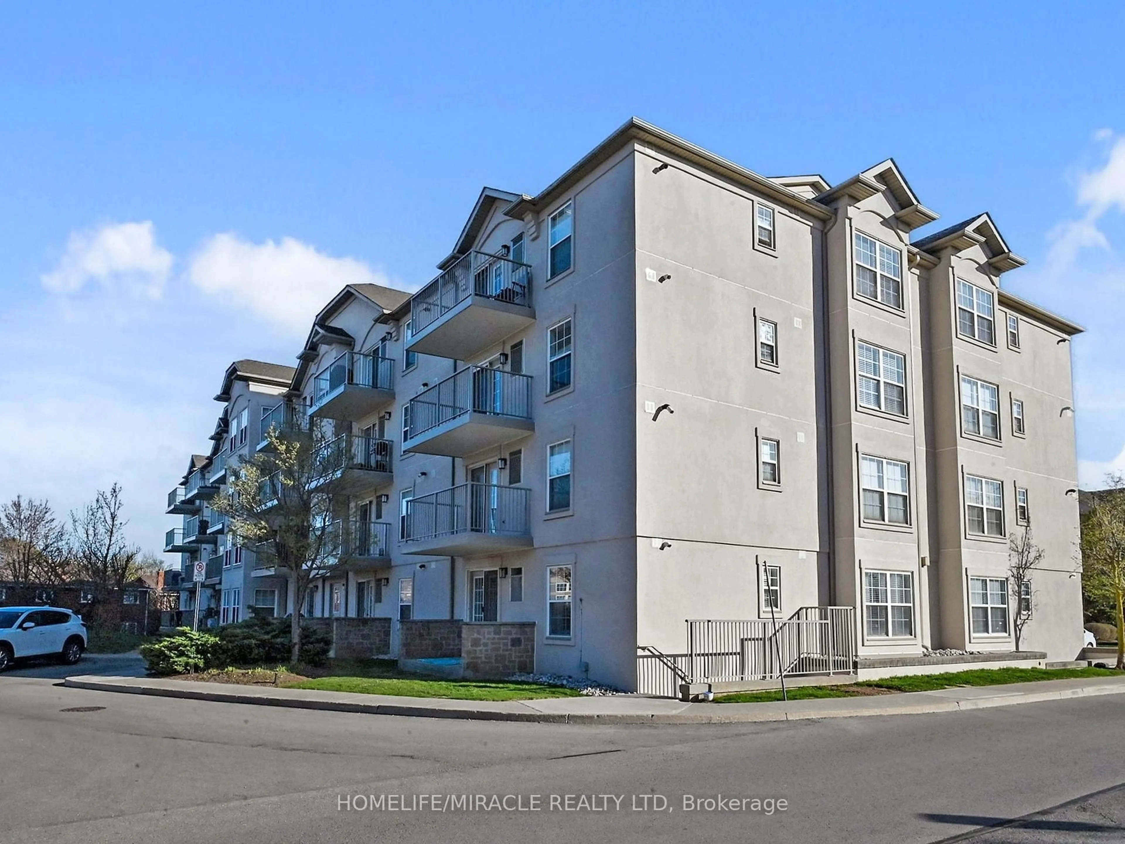 A pic from outside/outdoor area/front of a property/back of a property/a pic from drone, unknown for 1440 Bishops Gate #306, Oakville Ontario L6M 4M9