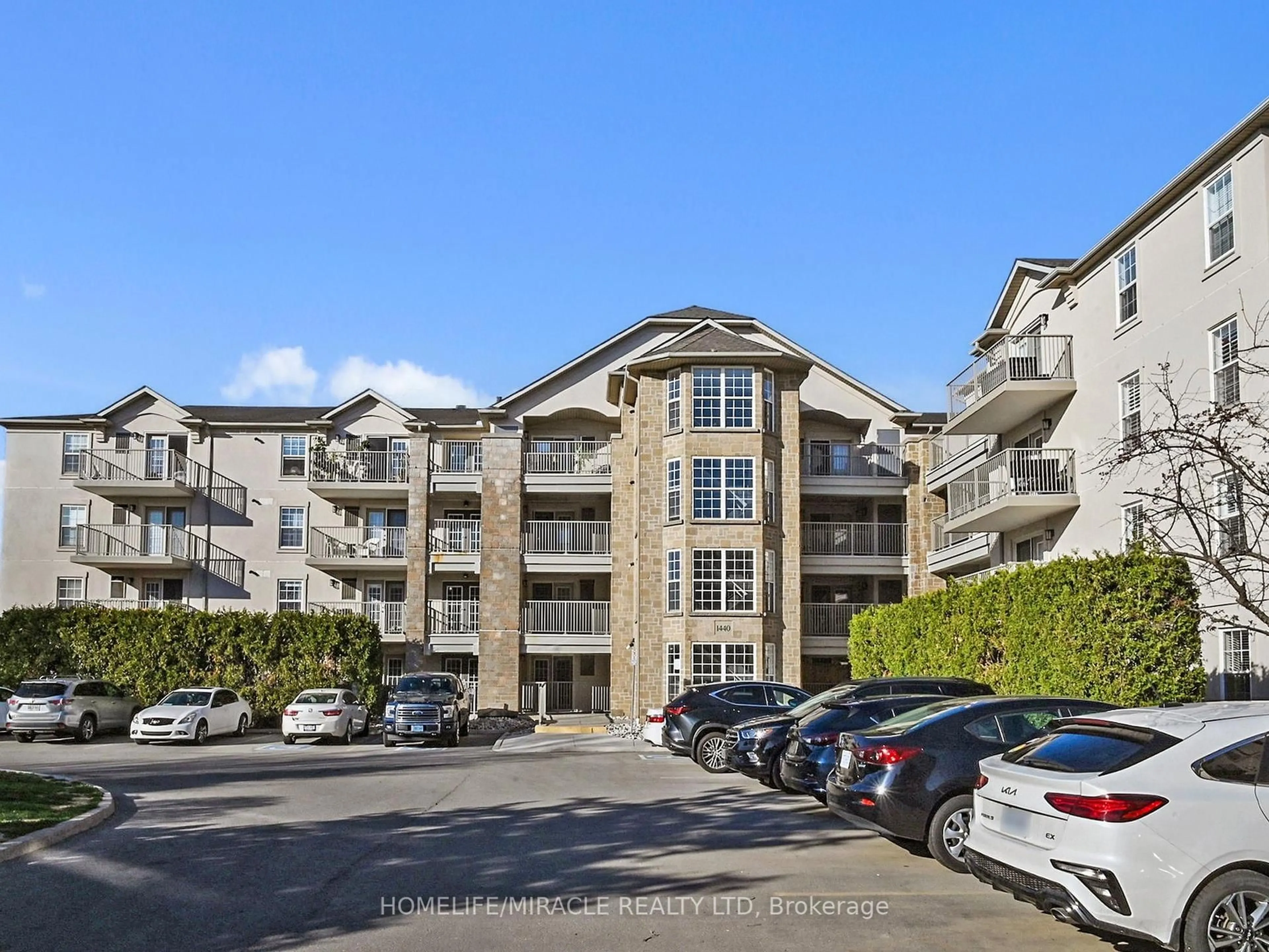 A pic from outside/outdoor area/front of a property/back of a property/a pic from drone, unknown for 1440 Bishops Gate #306, Oakville Ontario L6M 4M9