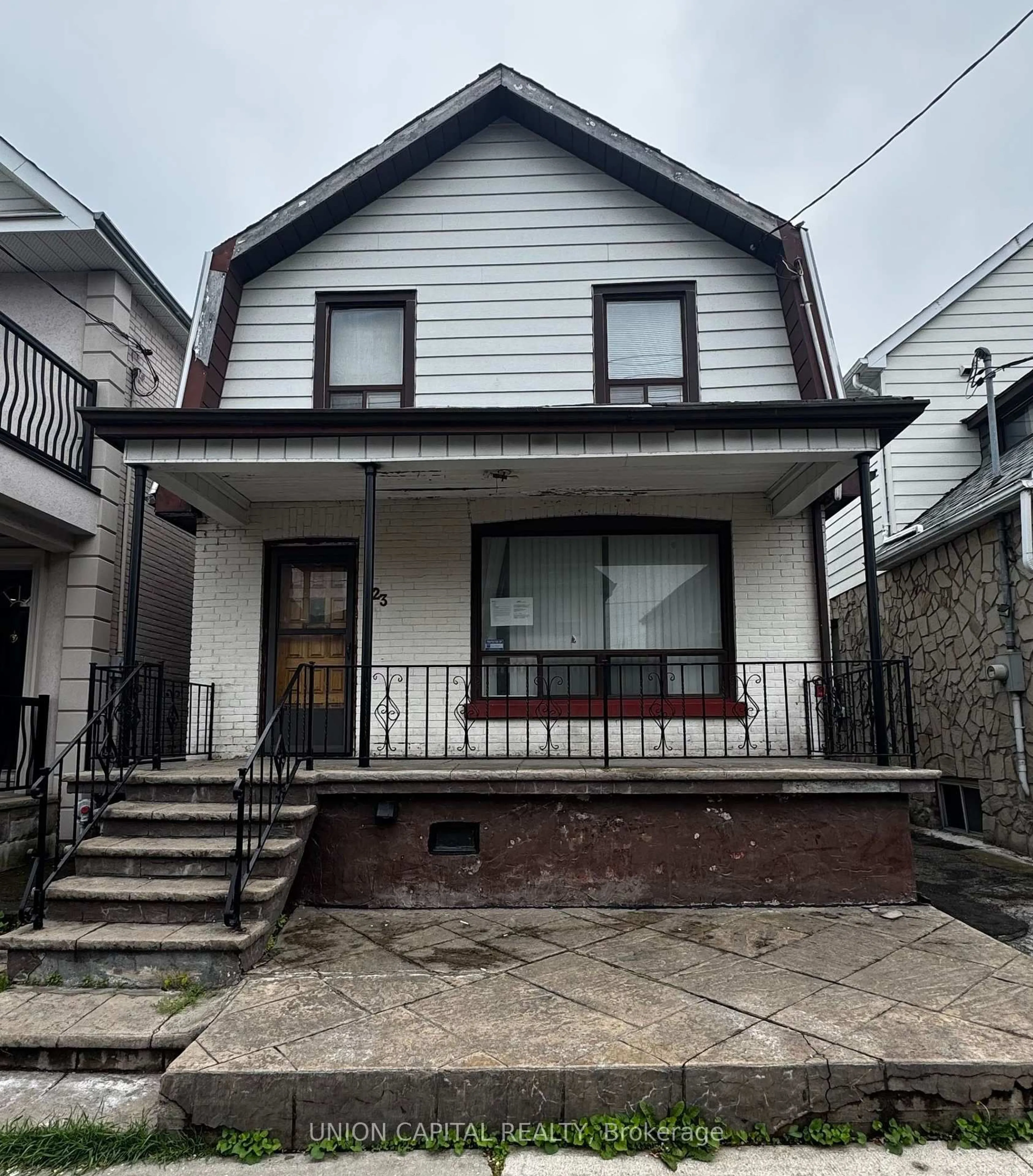Home with vinyl exterior material, street for 23 Nickle St, Toronto Ontario M6M 2H7