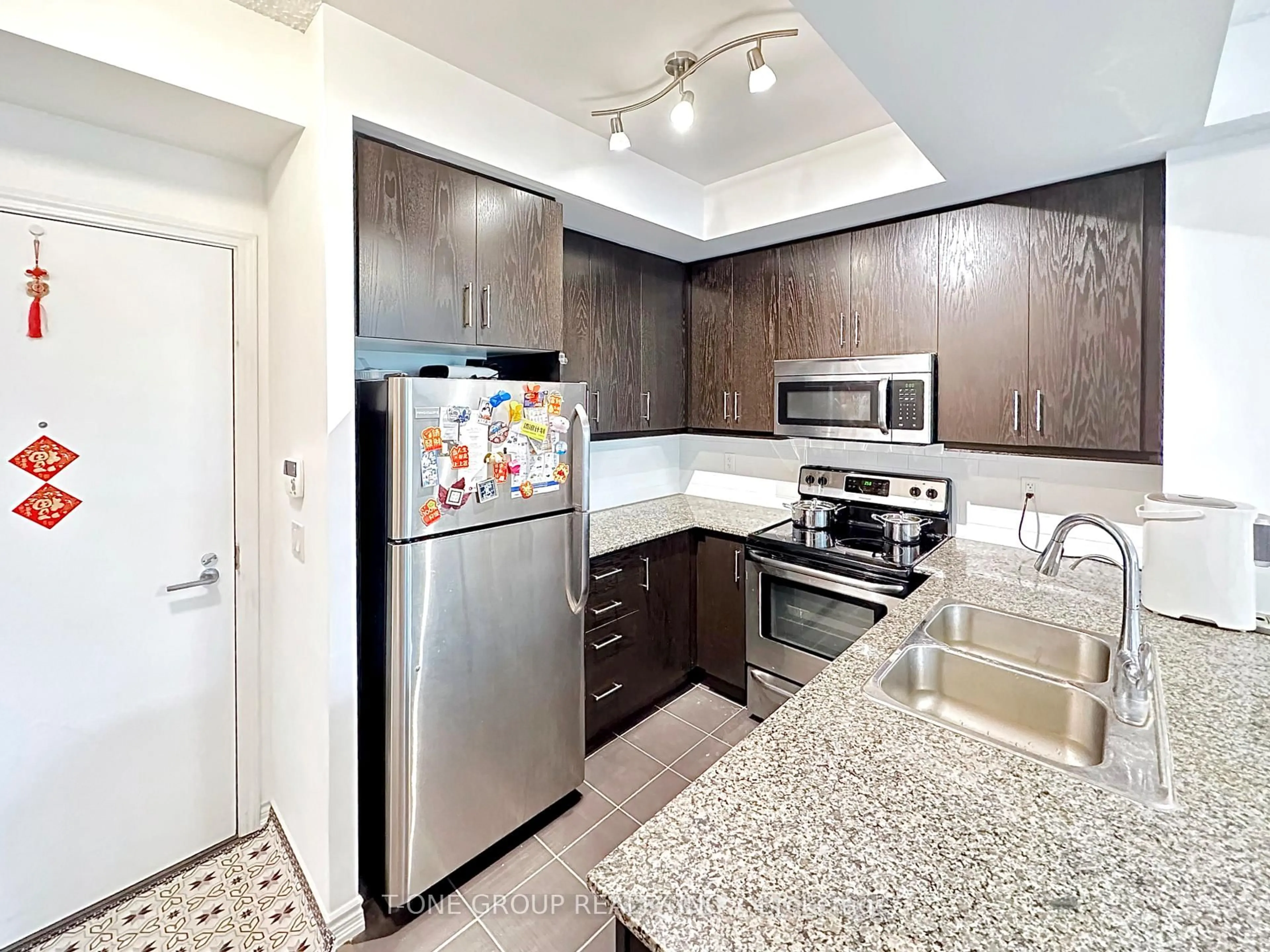 Standard kitchen, unknown for 15 James Finlay Way #717, Toronto Ontario M3M 0B3