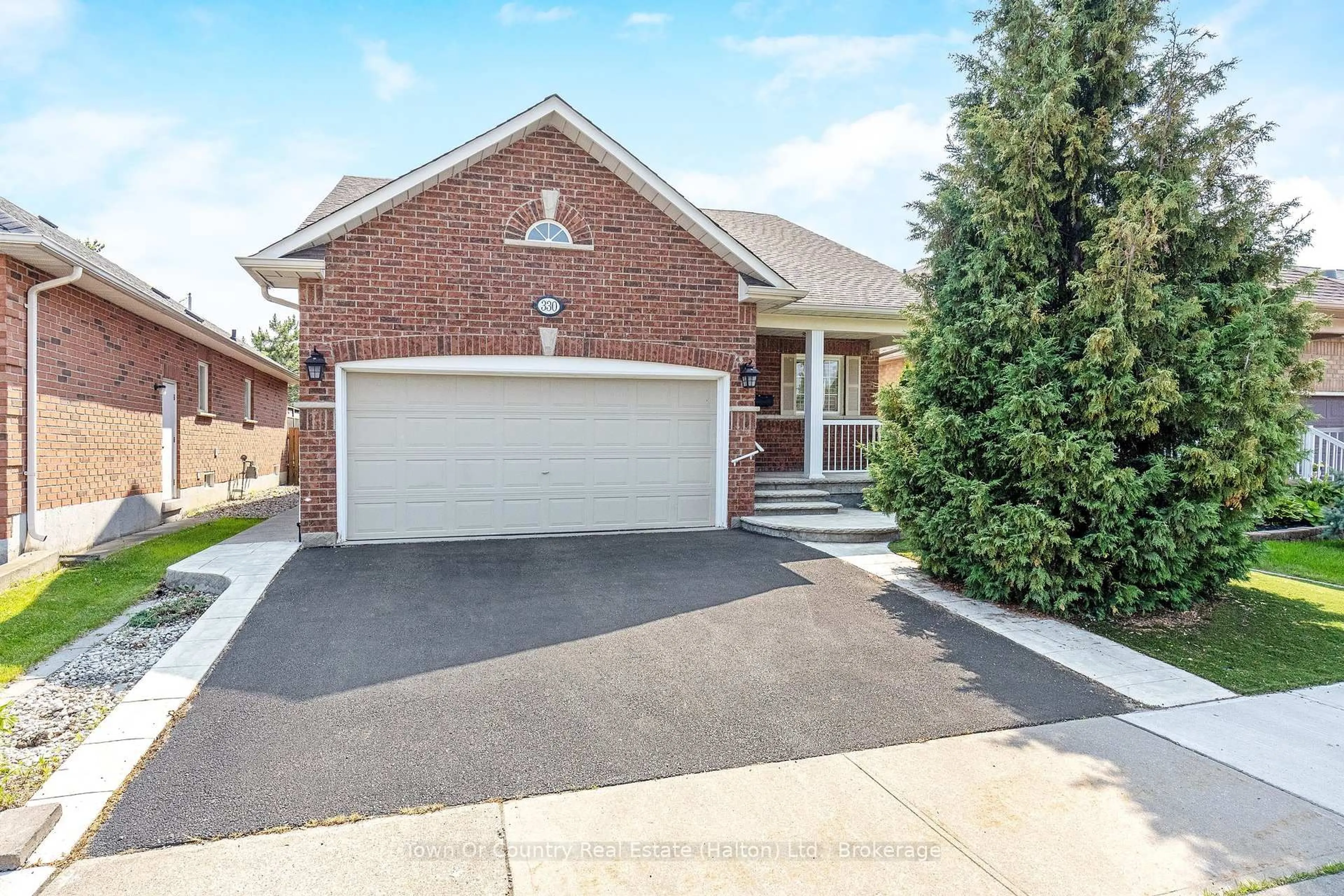Home with brick exterior material, street for 330 Centennial Forest Dr, Milton Ontario L9T 5X3