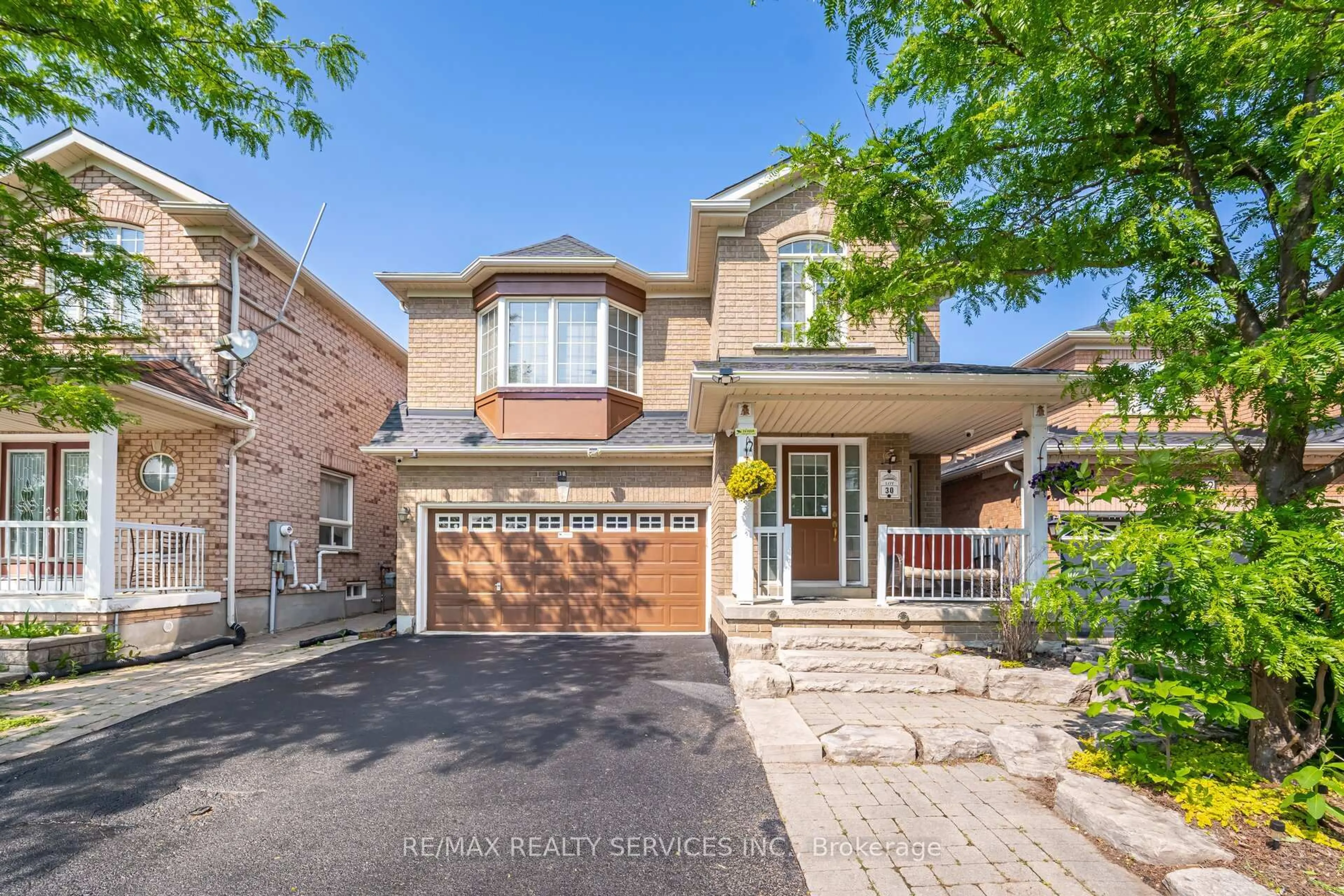 Home with brick exterior material, street for 30 Sams Cres, Brampton Ontario L7A 3R7