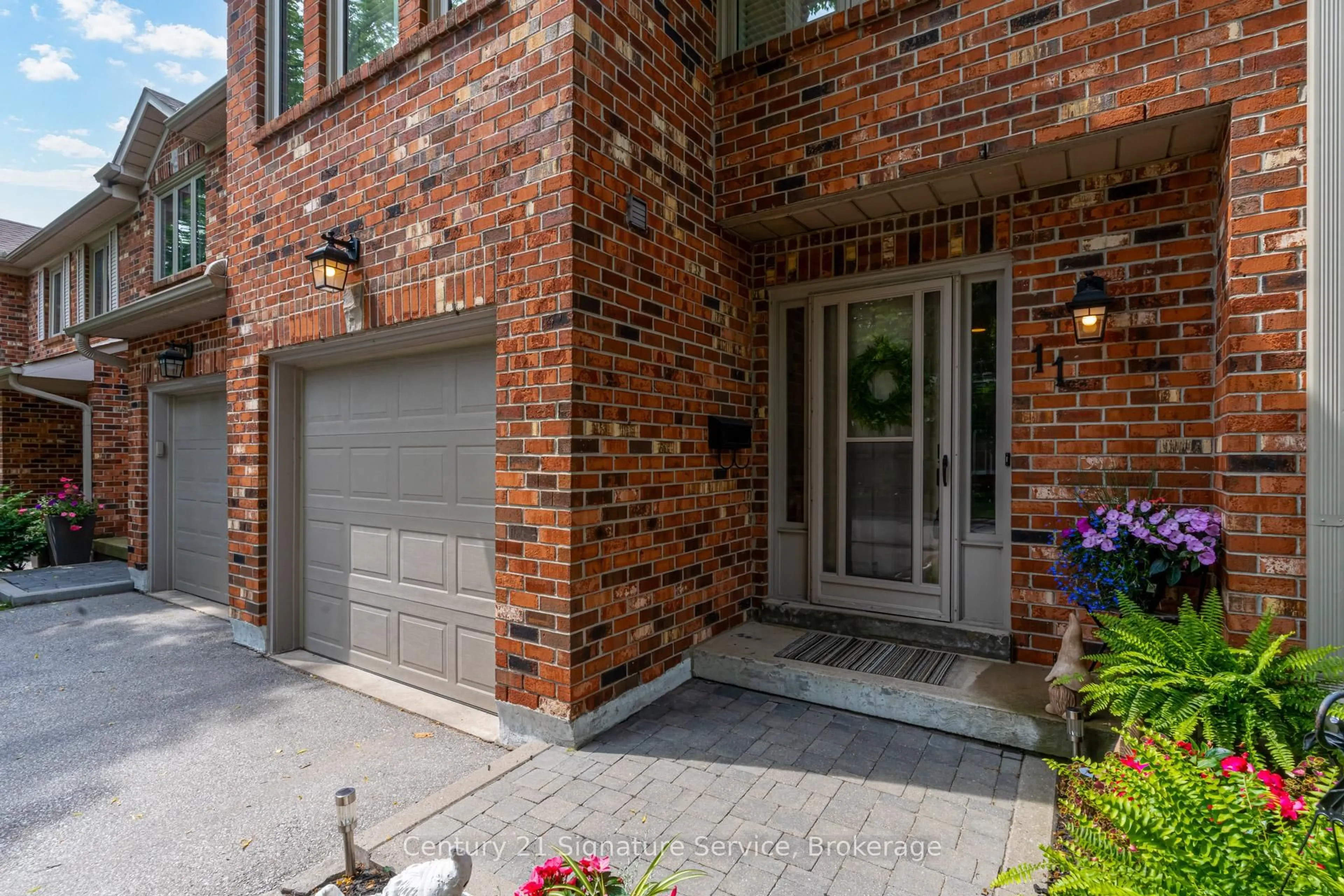 Home with brick exterior material, street for 2230 Walkers Line #11, Burlington Ontario L7M 3Y8