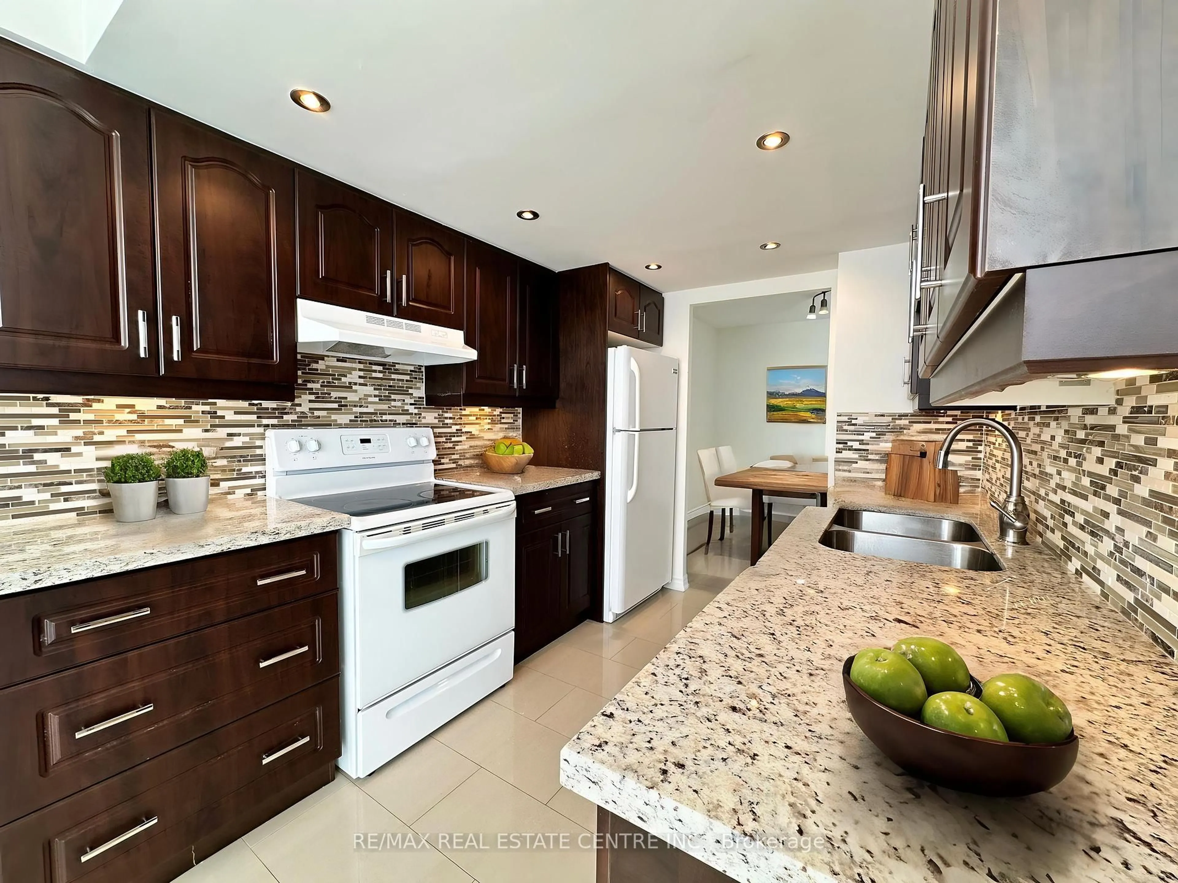 Contemporary kitchen, ceramic/tile floor for 1360 Rathburn Rd #302, Mississauga Ontario L4W 4H4