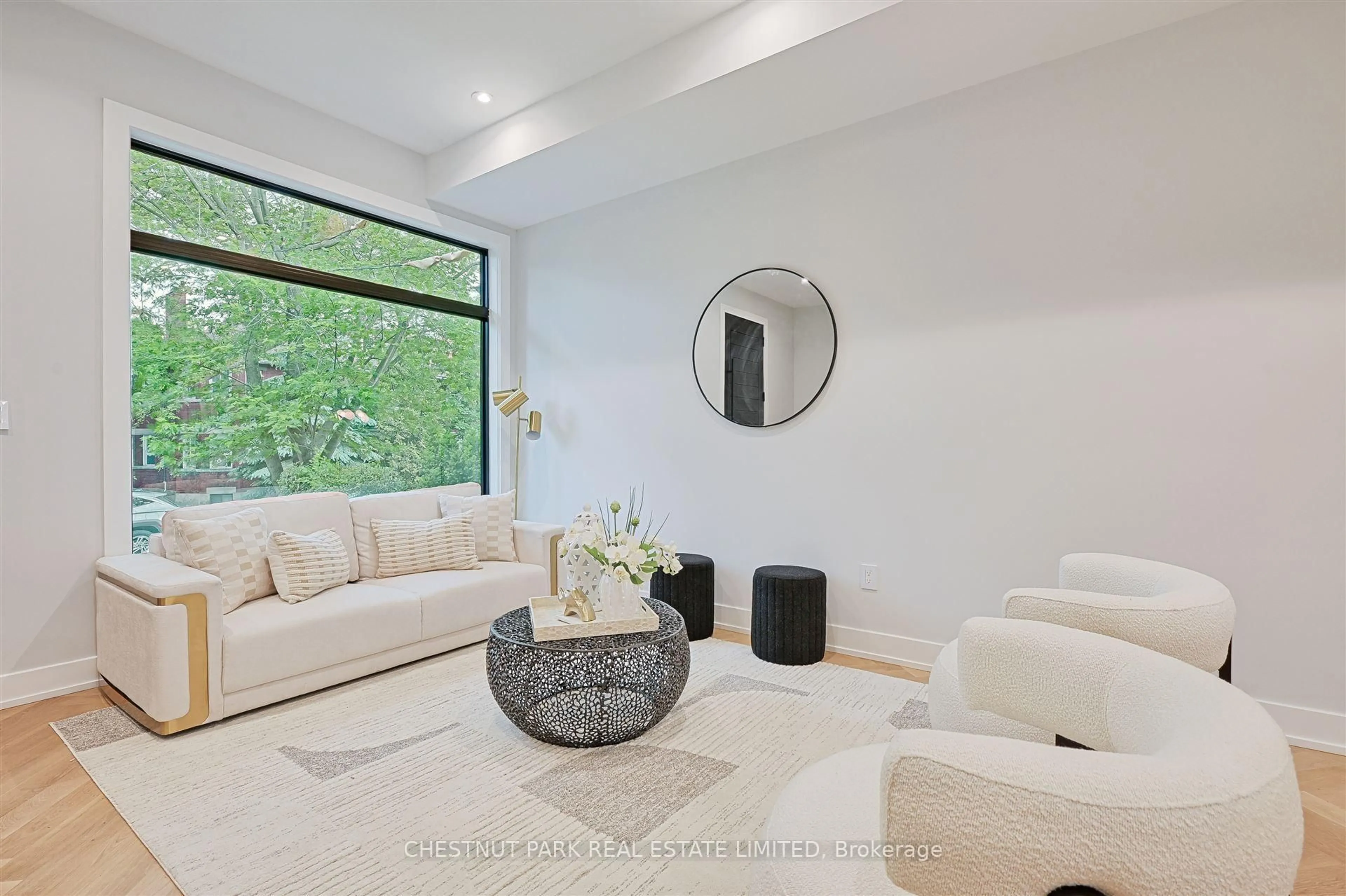 Living room with furniture, ceramic/tile floor for 222B Pearson Ave, Toronto Ontario M6R 1G7