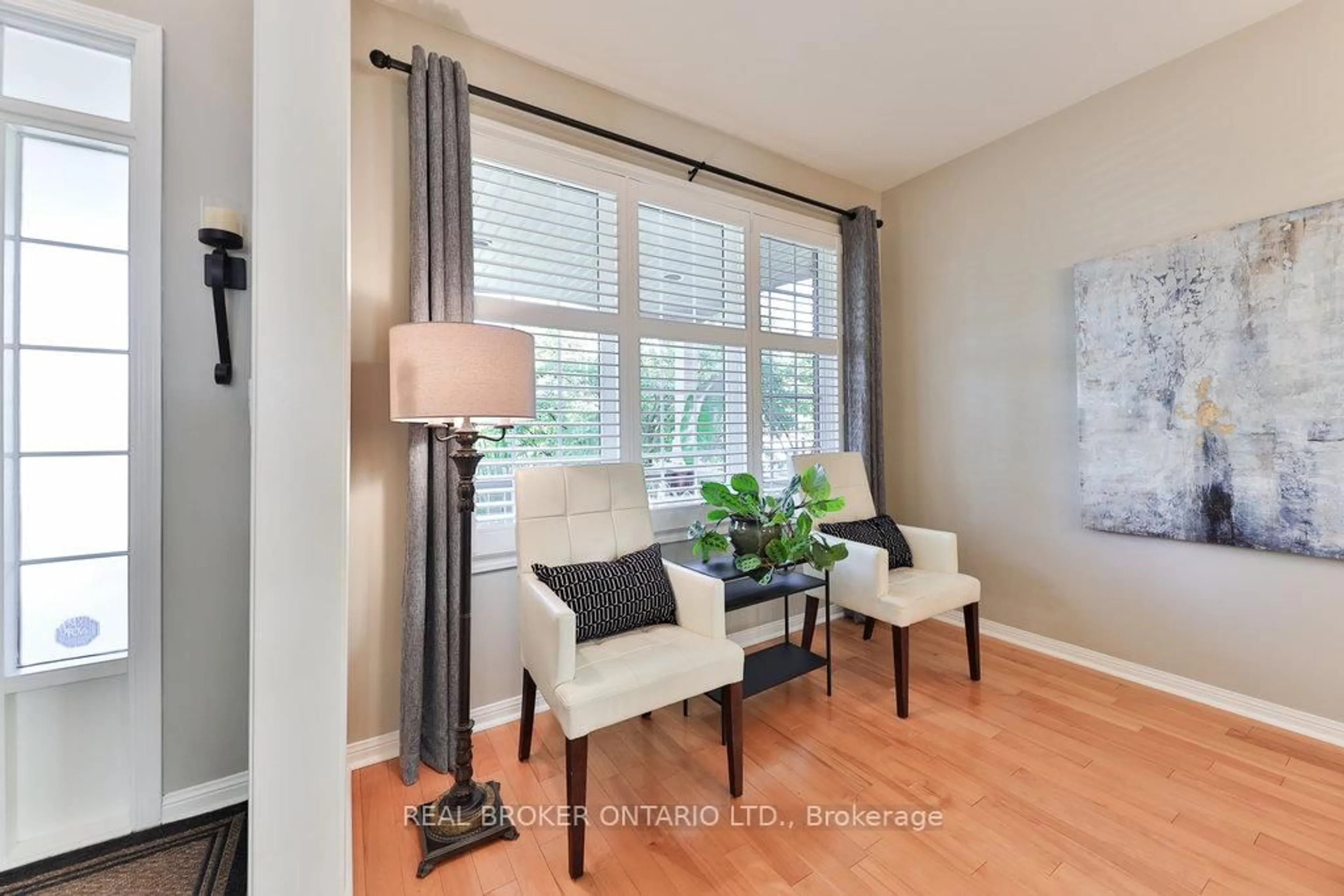 Living room with furniture, wood/laminate floor for 591 Caverhill Cres, Milton Ontario L9T 5K1