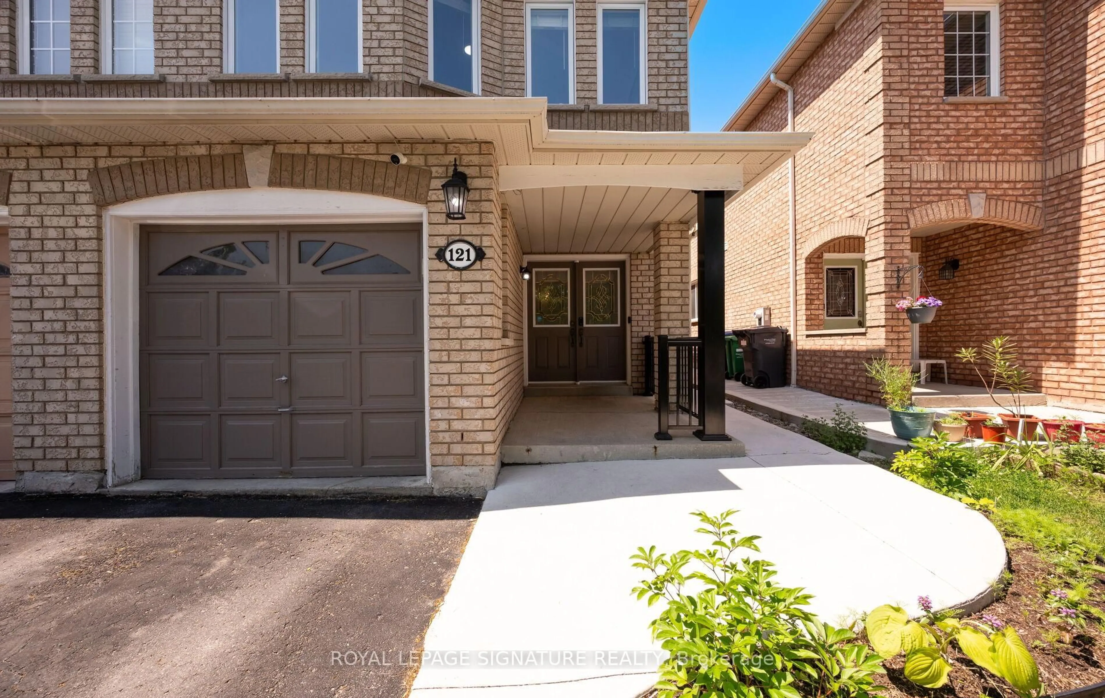 Home with brick exterior material, street for 121 Native Landing, Brampton Ontario L6X 5A9