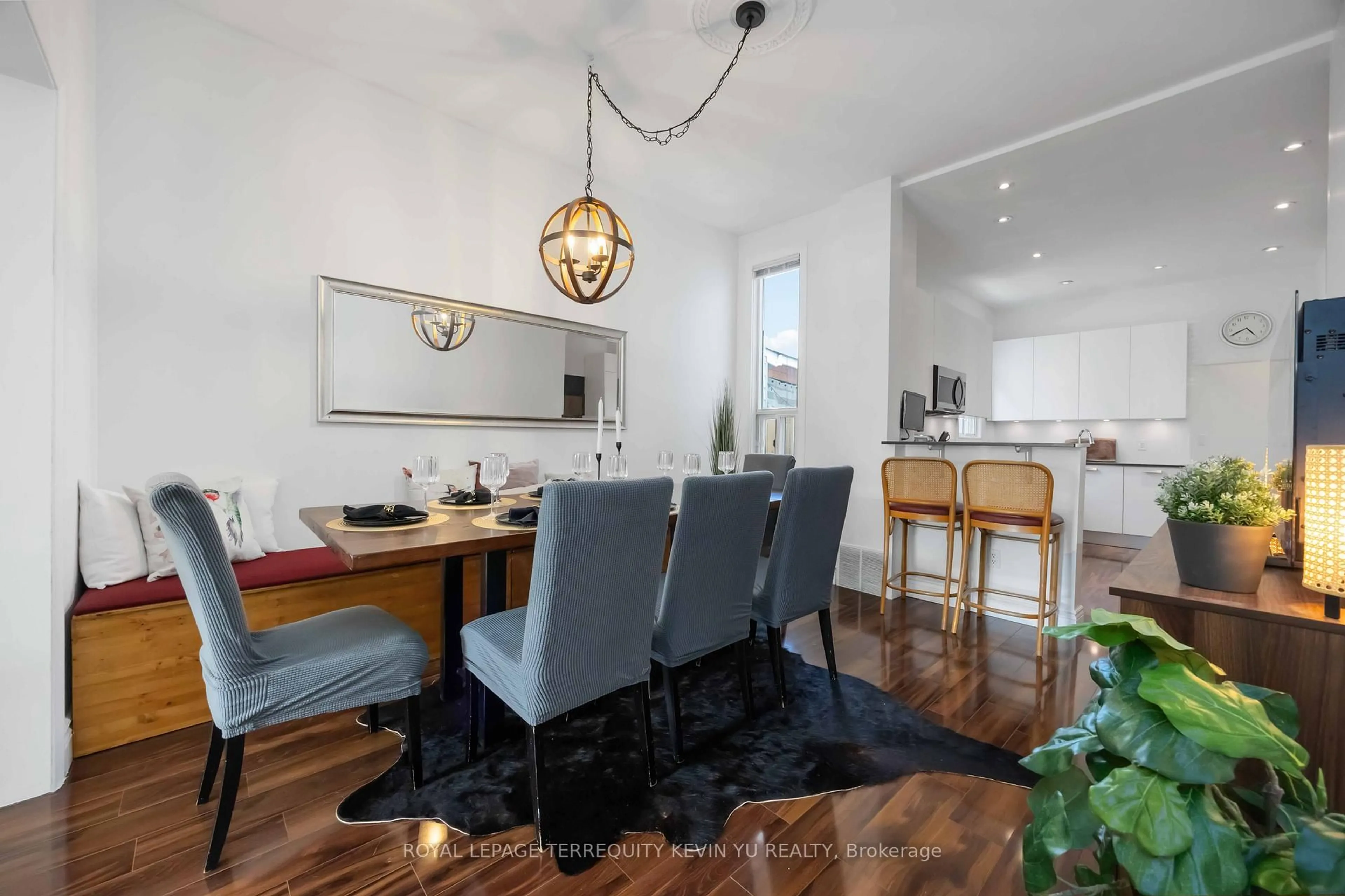 Dining room, wood/laminate floor for 23 Edwin Ave, Toronto Ontario M6P 3Z5