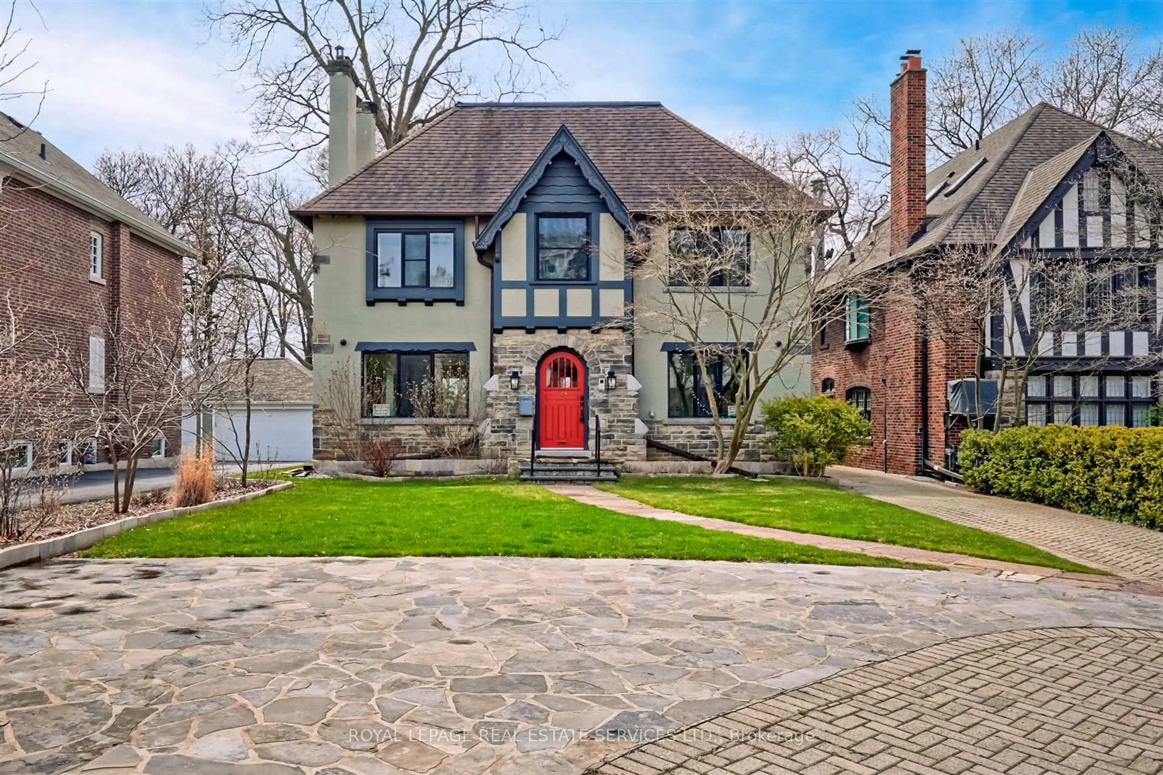 Home with brick exterior material, street for 324 Riverside Dr, Toronto Ontario M6S 4B2