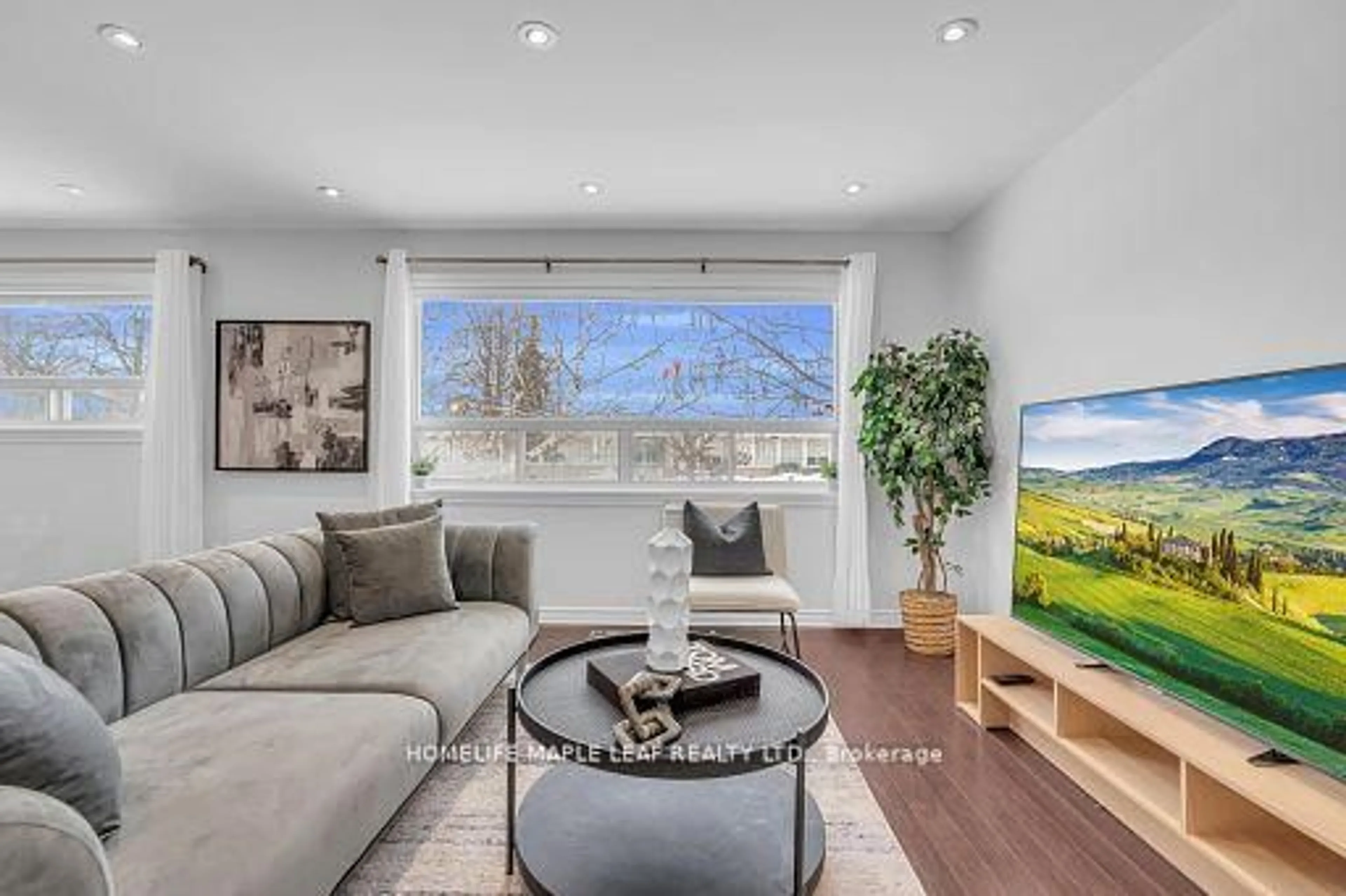 Living room with furniture, unknown for 12 Abbey Rd, Brampton Ontario L6W 2T8