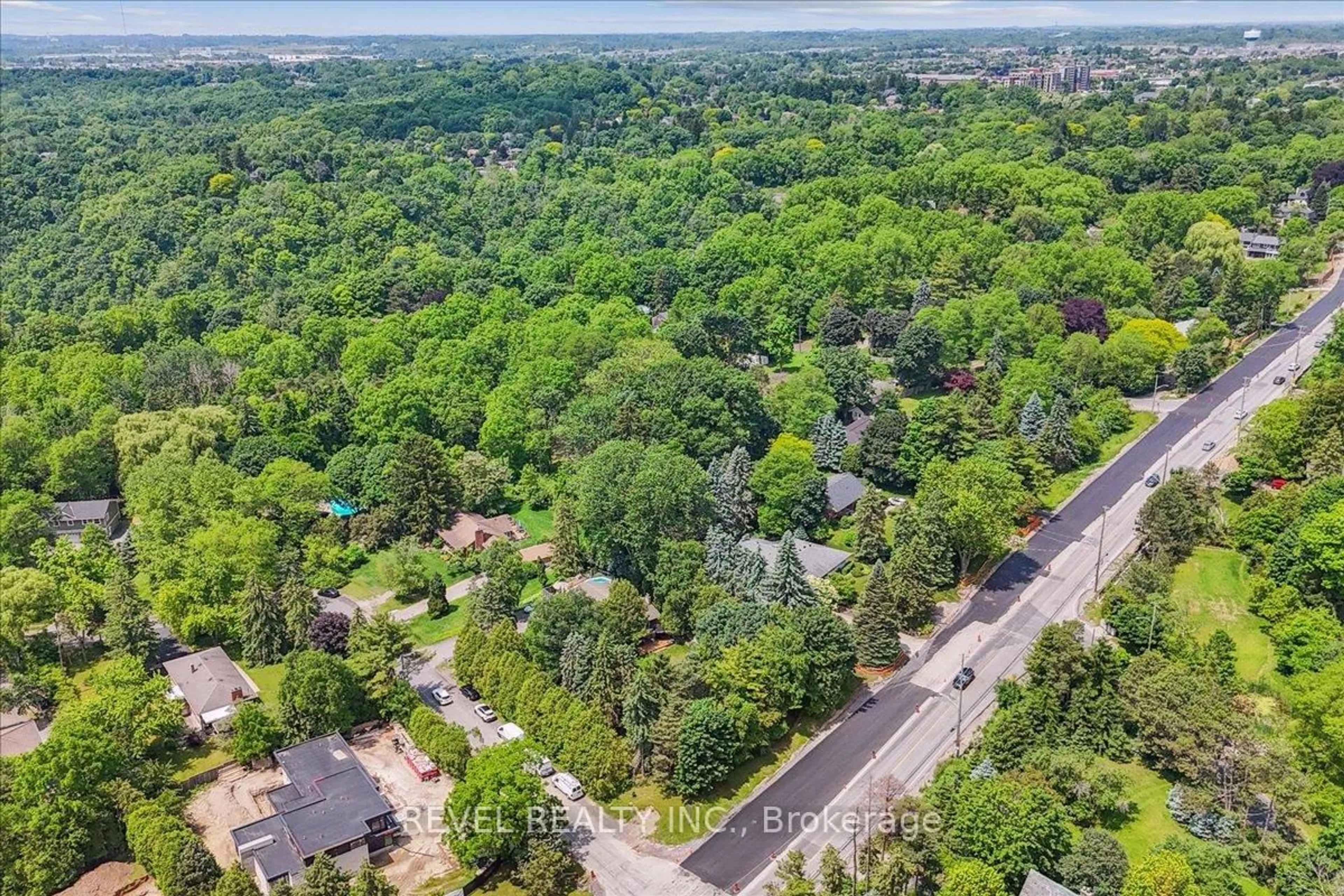 A pic from outside/outdoor area/front of a property/back of a property/a pic from drone, forest/trees view for 15 Ireson Rd, Burlington Ontario L7R 3X5