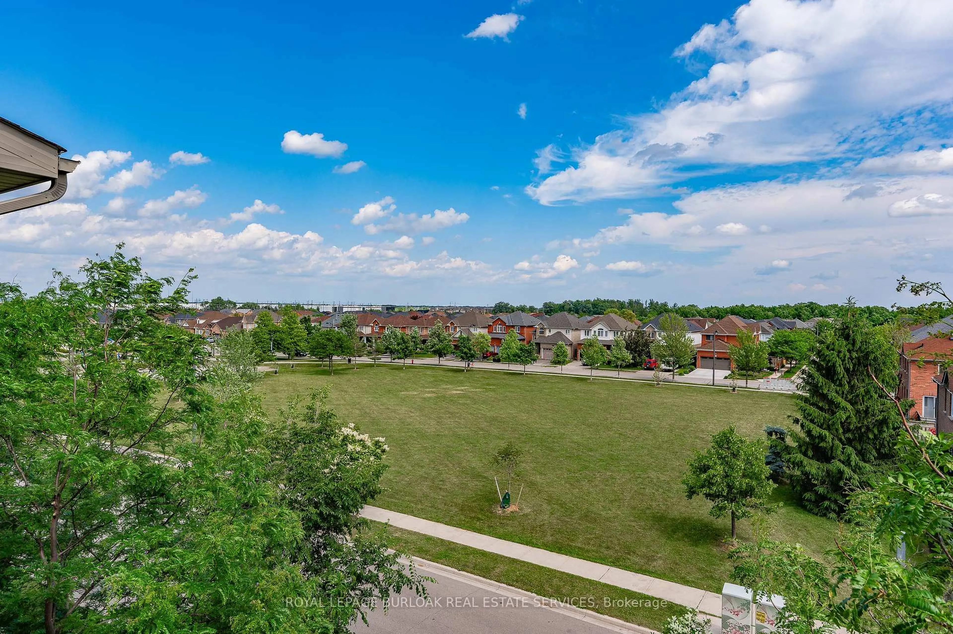 A pic from outside/outdoor area/front of a property/back of a property/a pic from drone, city buildings view from balcony for 1370 Main St #409, Milton Ontario L9T 7S8