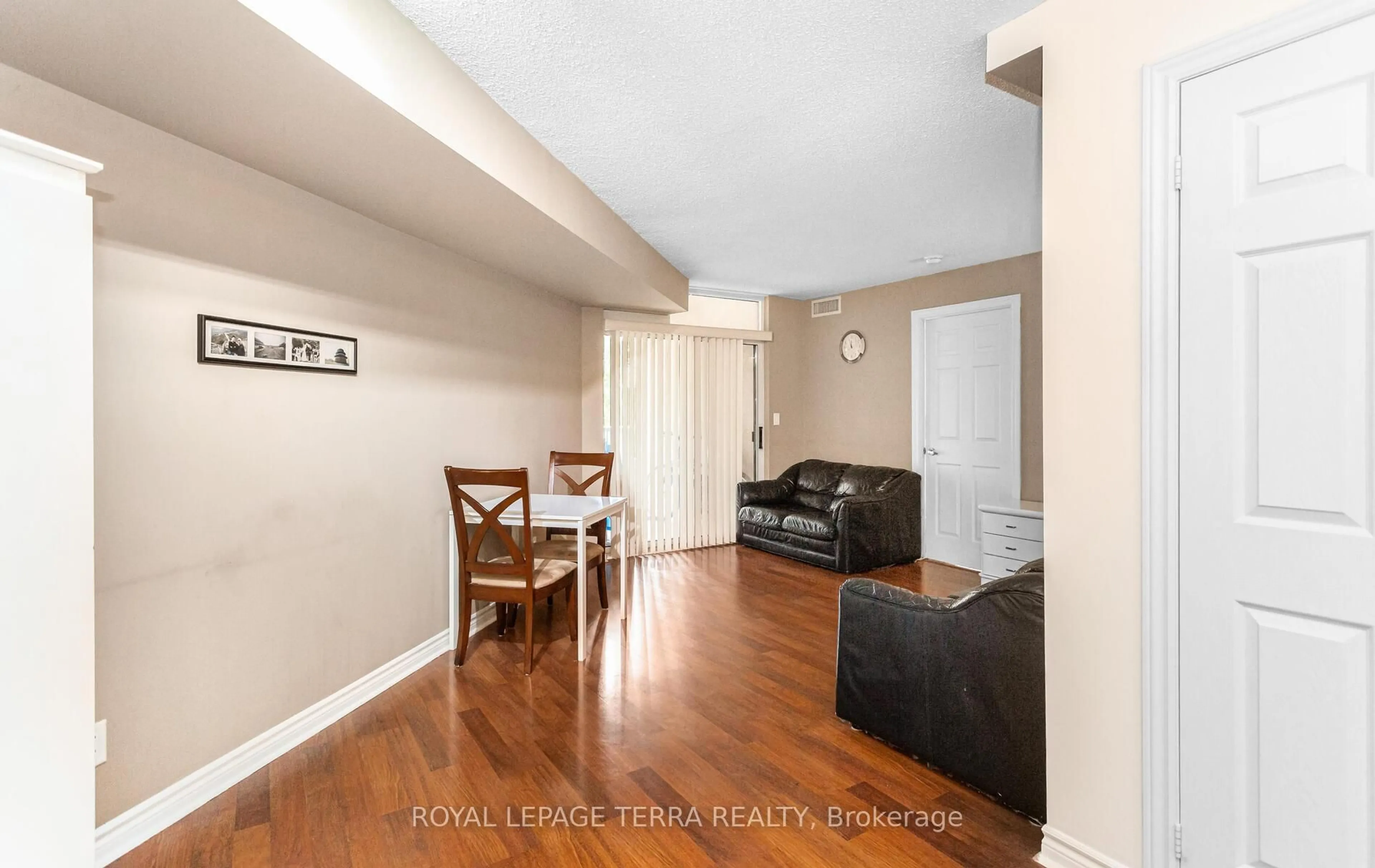 Living room with furniture, wood/laminate floor for 3888 Duke Of York Blvd #430, Mississauga Ontario L5B 4P5