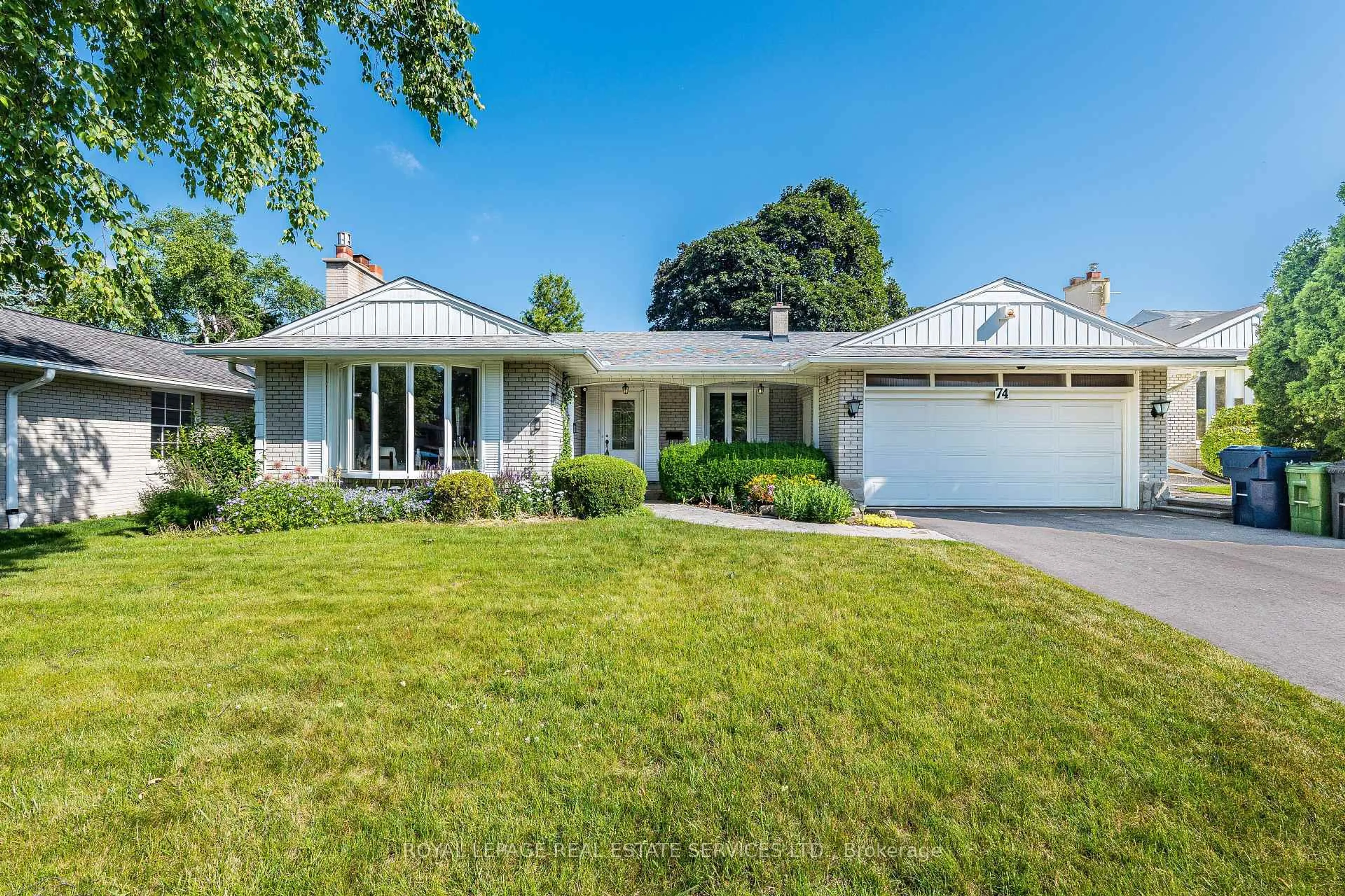 Home with vinyl exterior material, street for 74 Prince George Dr, Toronto Ontario M9A 1Y6