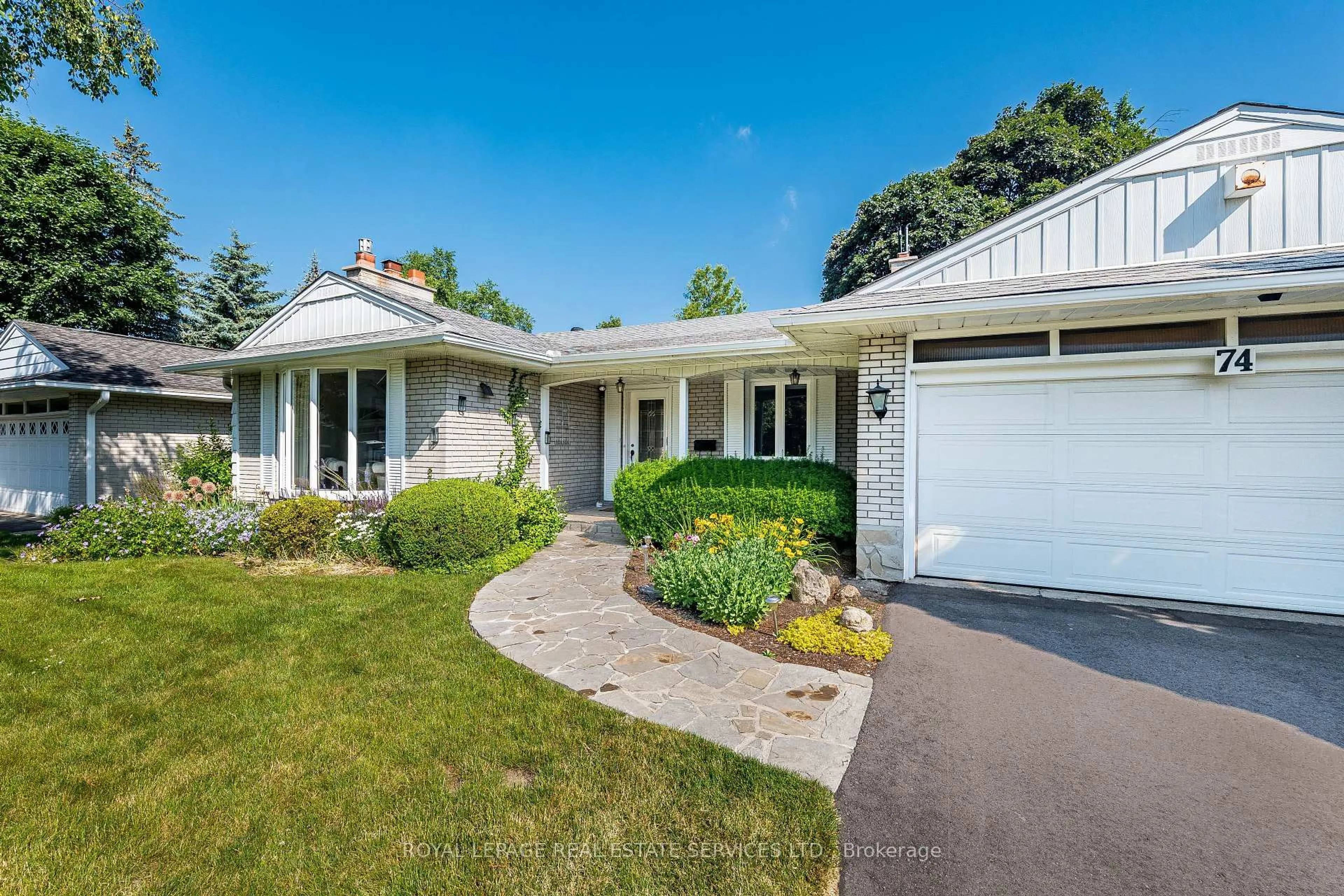Home with vinyl exterior material, street for 74 Prince George Dr, Toronto Ontario M9A 1Y6