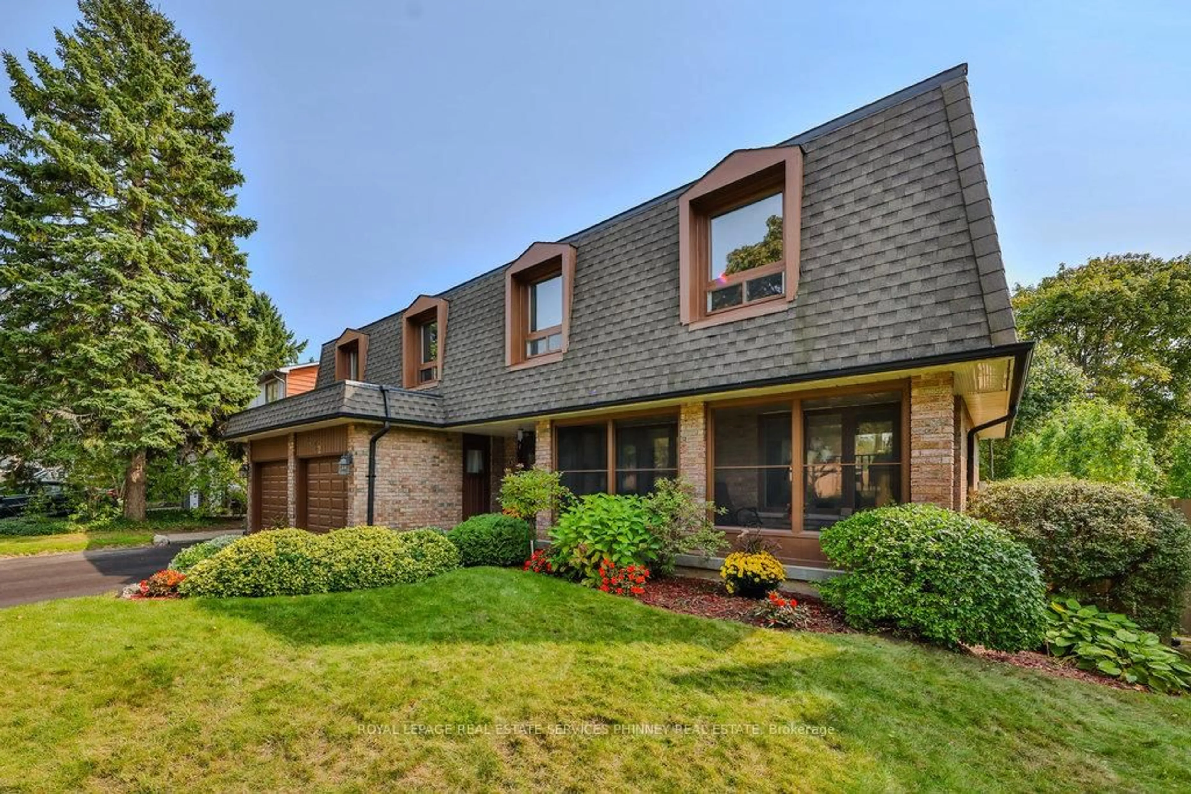 Home with brick exterior material, street for 1432 Bridgestone Lane, Mississauga Ontario L5J 4E2