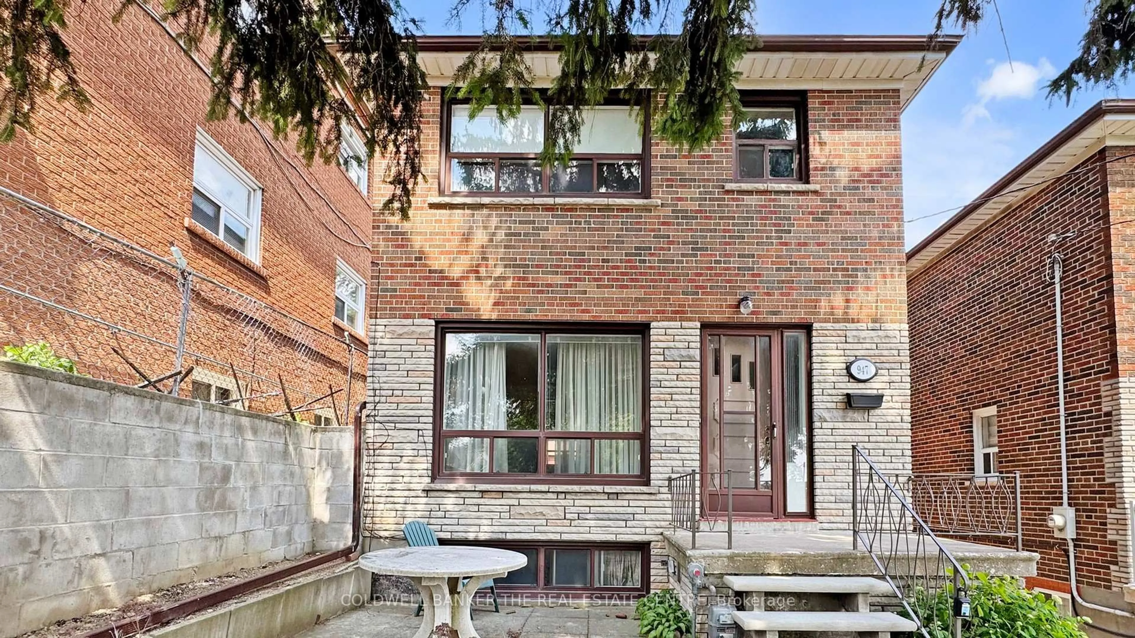 Home with brick exterior material, street for 947 Saint Clarens Ave, Toronto Ontario M6H 3X8