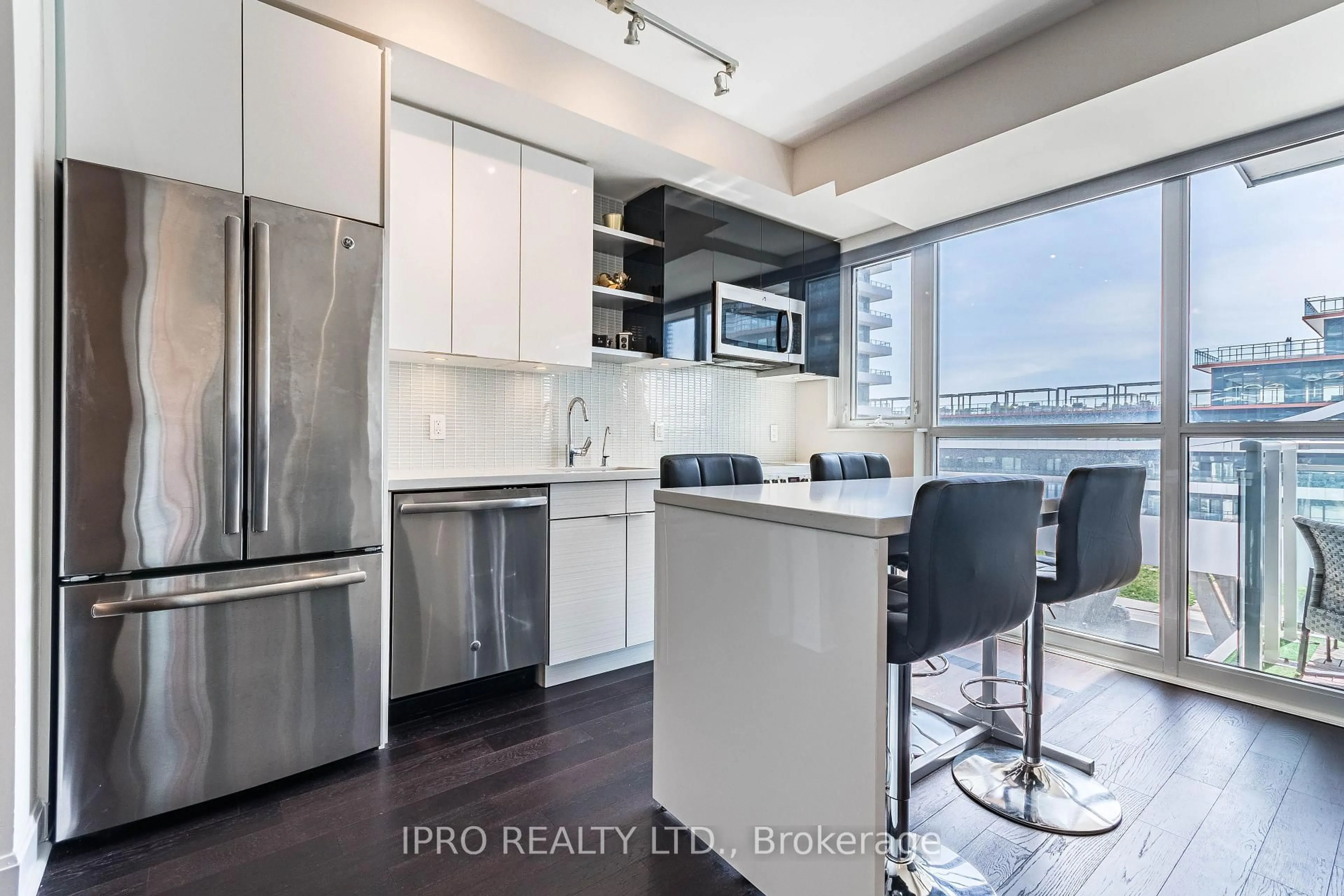 Open concept kitchen, unknown for 33 Shore Breeze #511, Toronto Ontario M8V 0G1