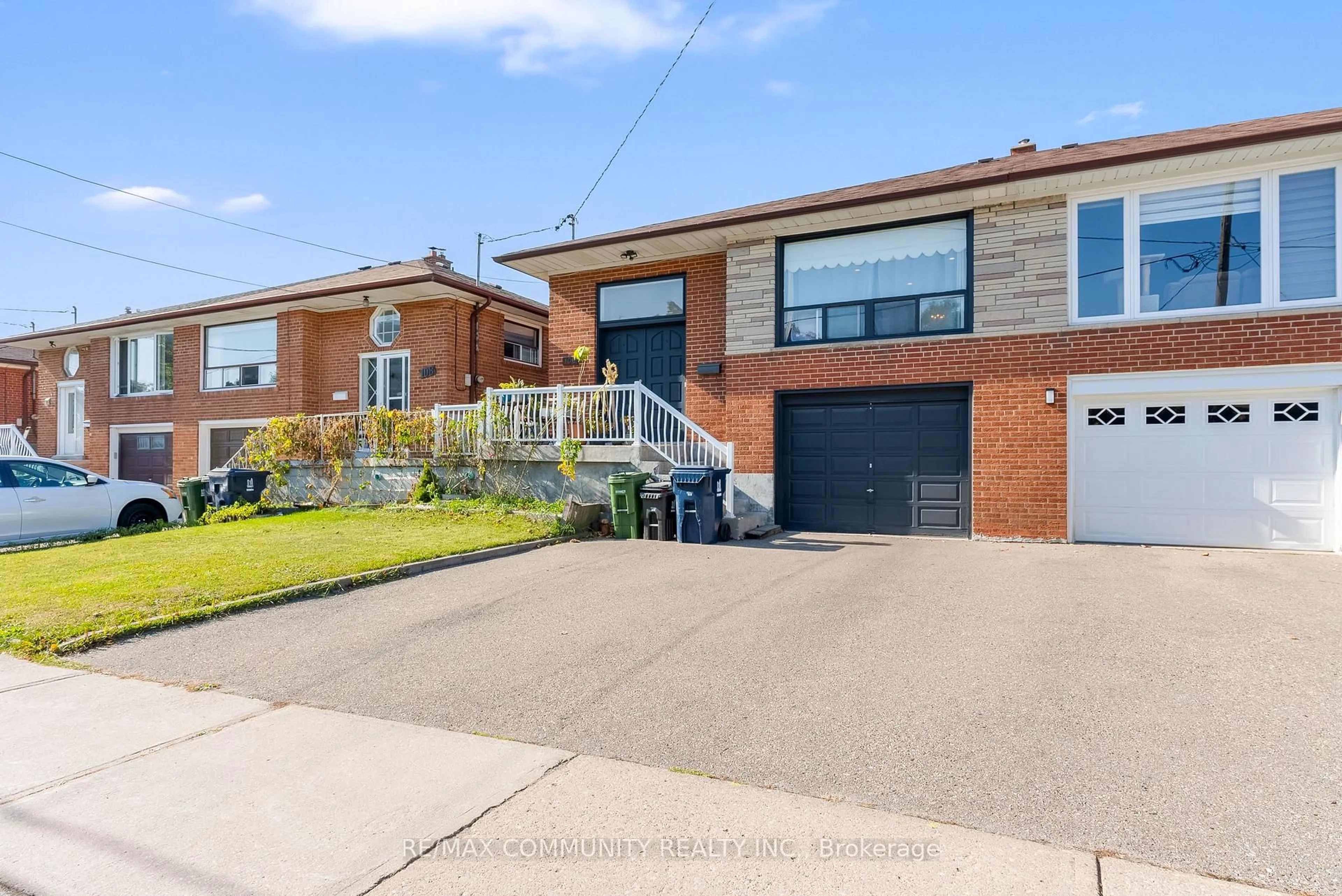 Home with brick exterior material, street for 106 Victory Dr, Toronto Ontario M3M 2J8