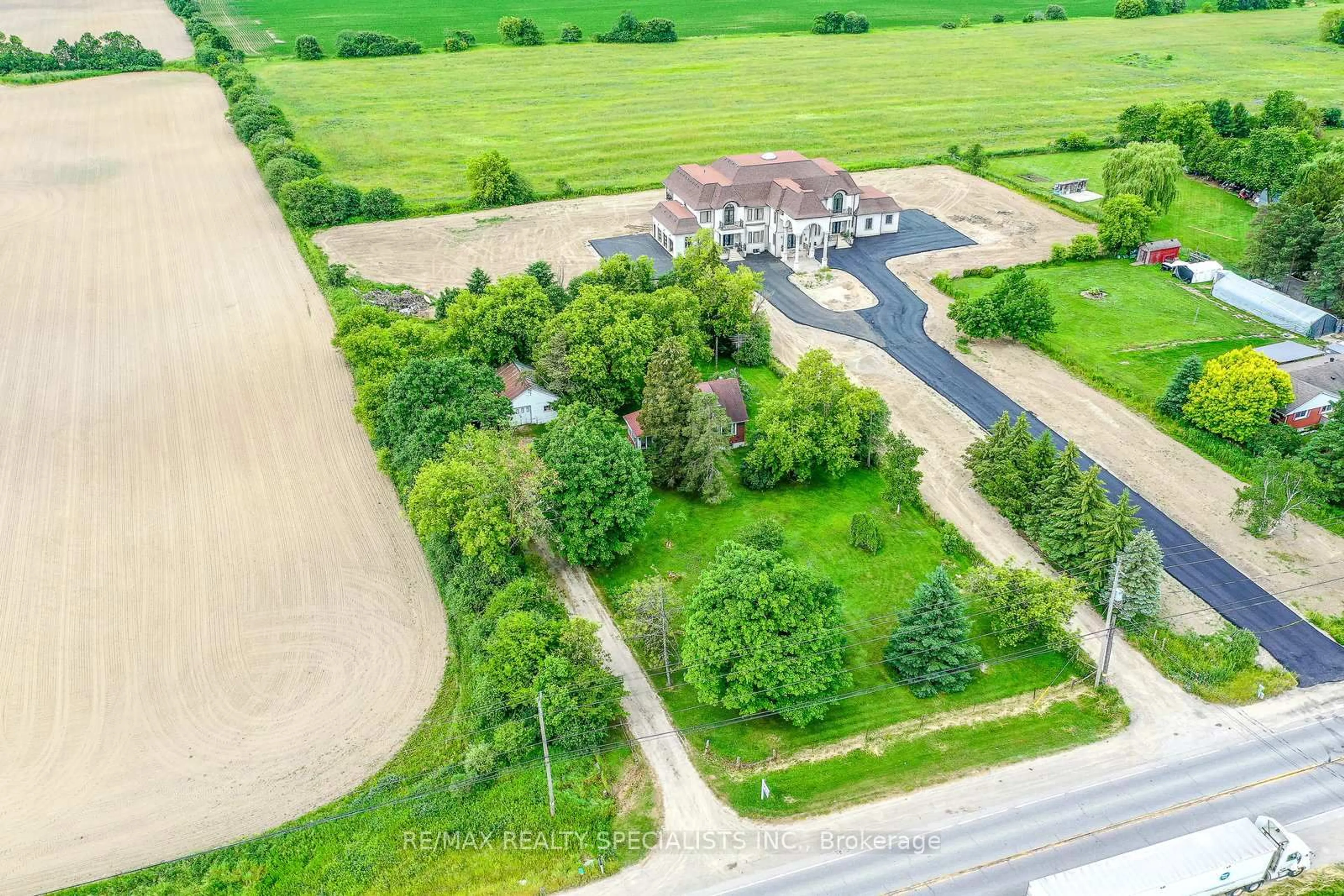 A pic from outside/outdoor area/front of a property/back of a property/a pic from drone, street for 15208 Airport Rd, Caledon Ontario L7C 2W7