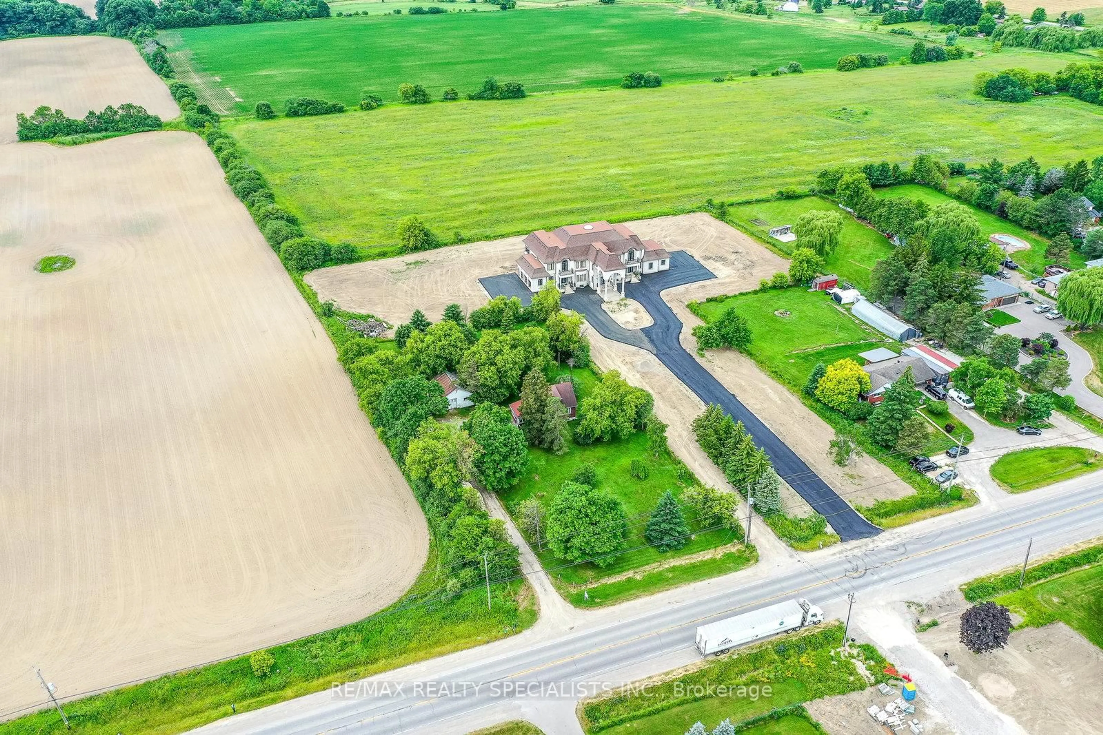 A pic from outside/outdoor area/front of a property/back of a property/a pic from drone, street for 15208 Airport Rd, Caledon Ontario L7C 2W7