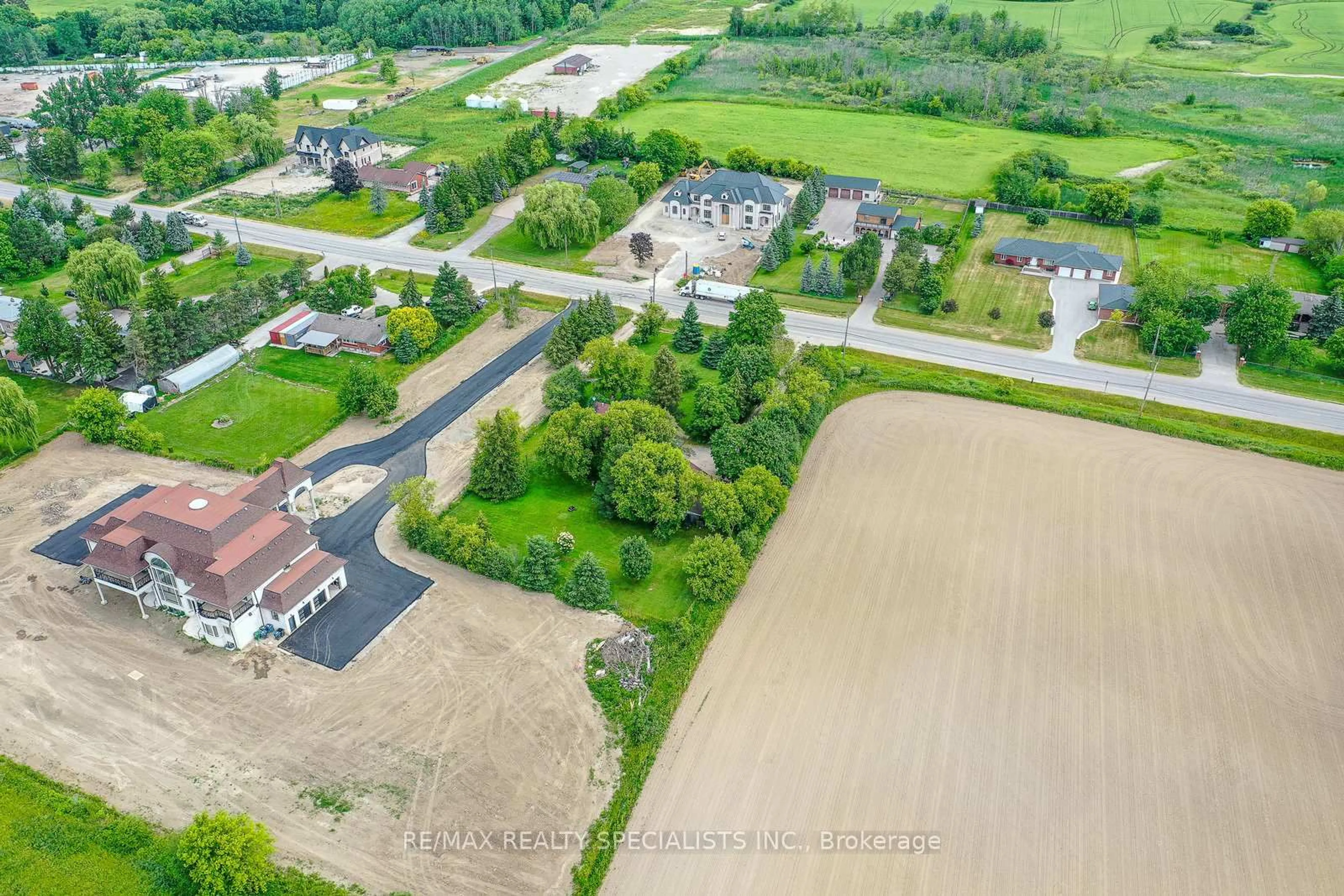A pic from outside/outdoor area/front of a property/back of a property/a pic from drone, street for 15208 Airport Rd, Caledon Ontario L7C 2W7