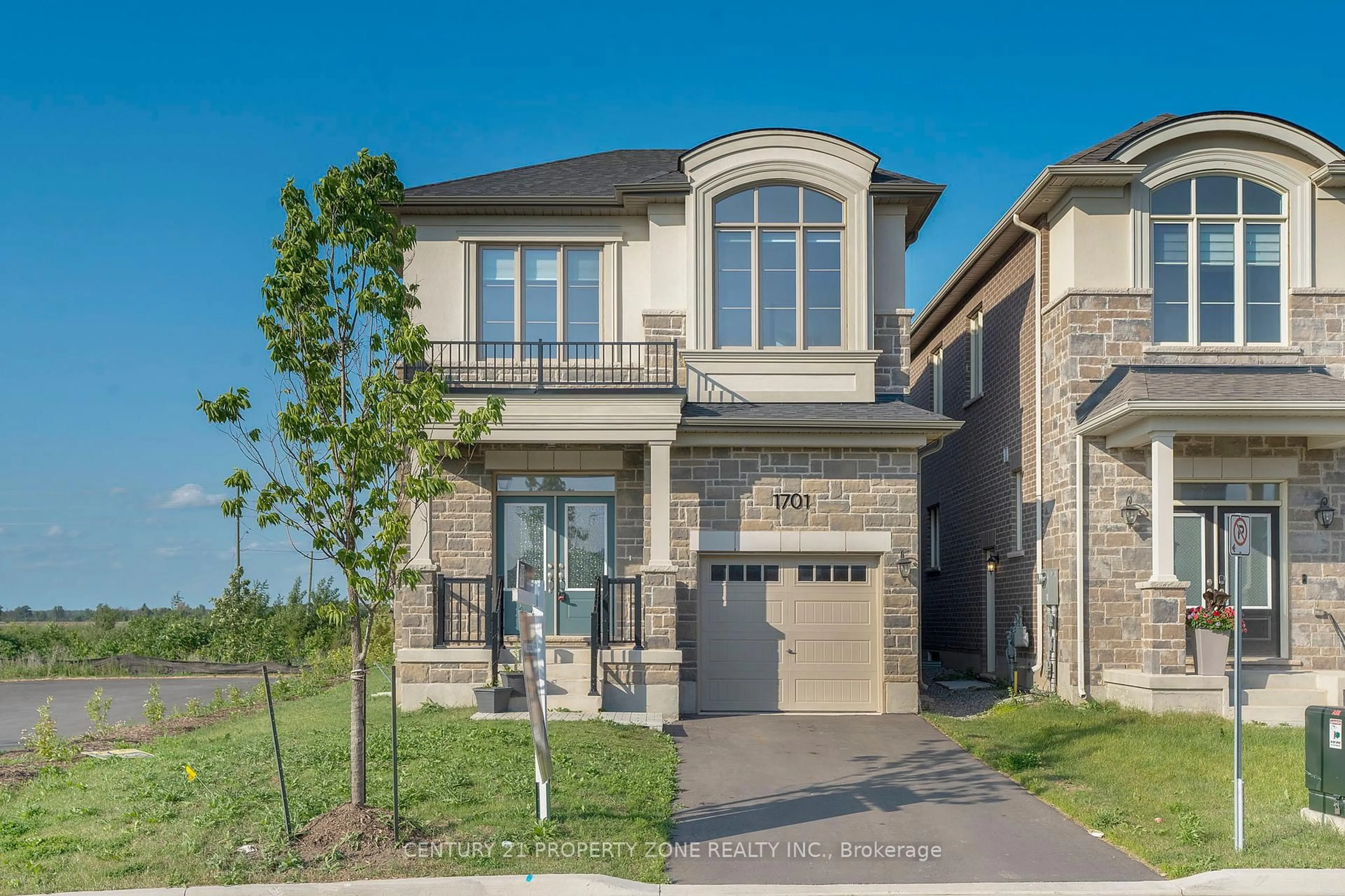 Home with brick exterior material, street for 1701 Thames Circ, Milton Ontario L9E 1Y5