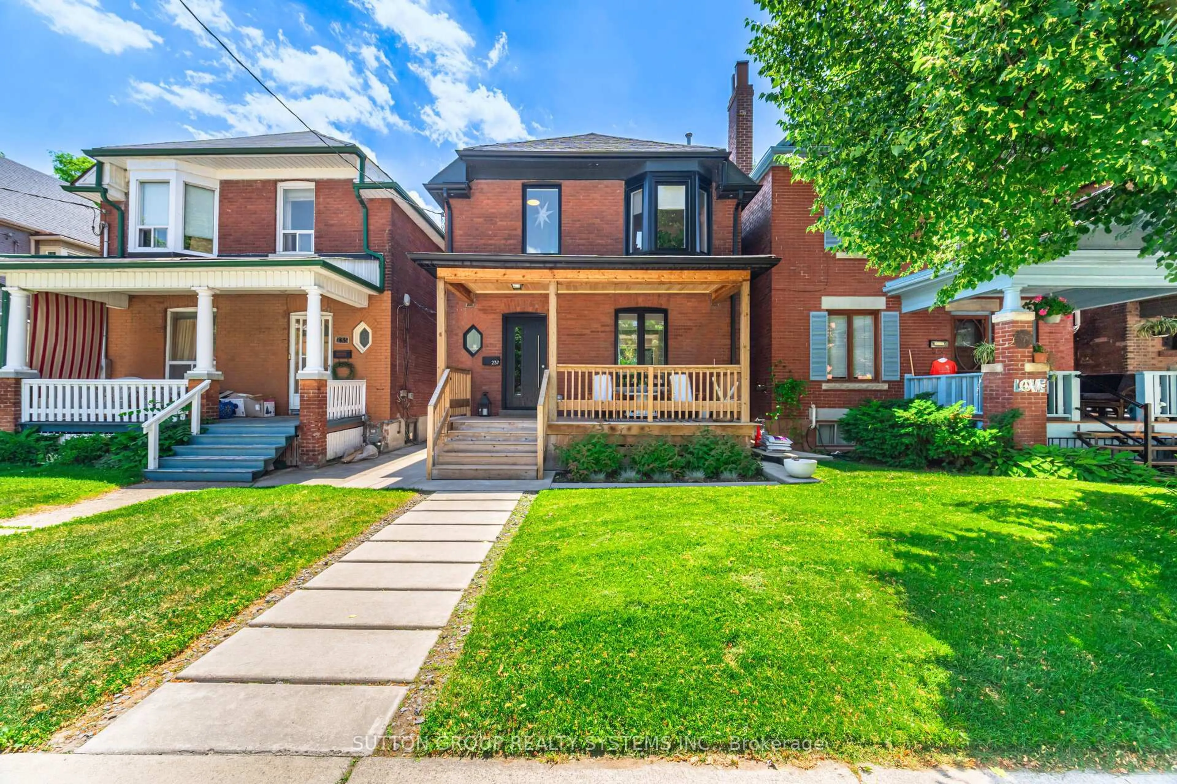 Home with brick exterior material, street for 237 St Johns Rd, Toronto Ontario M6P 1V3