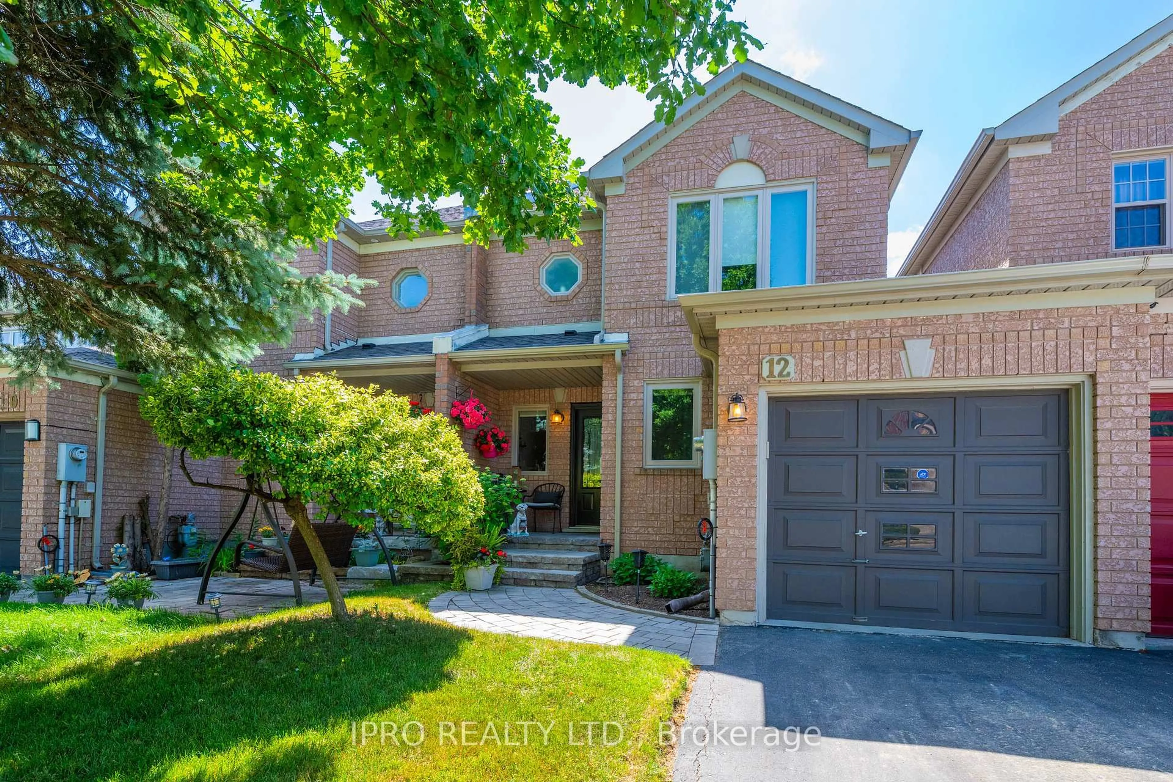 Home with brick exterior material, street for 12 Forestgrove Circ, Brampton Ontario L6Z 4T2