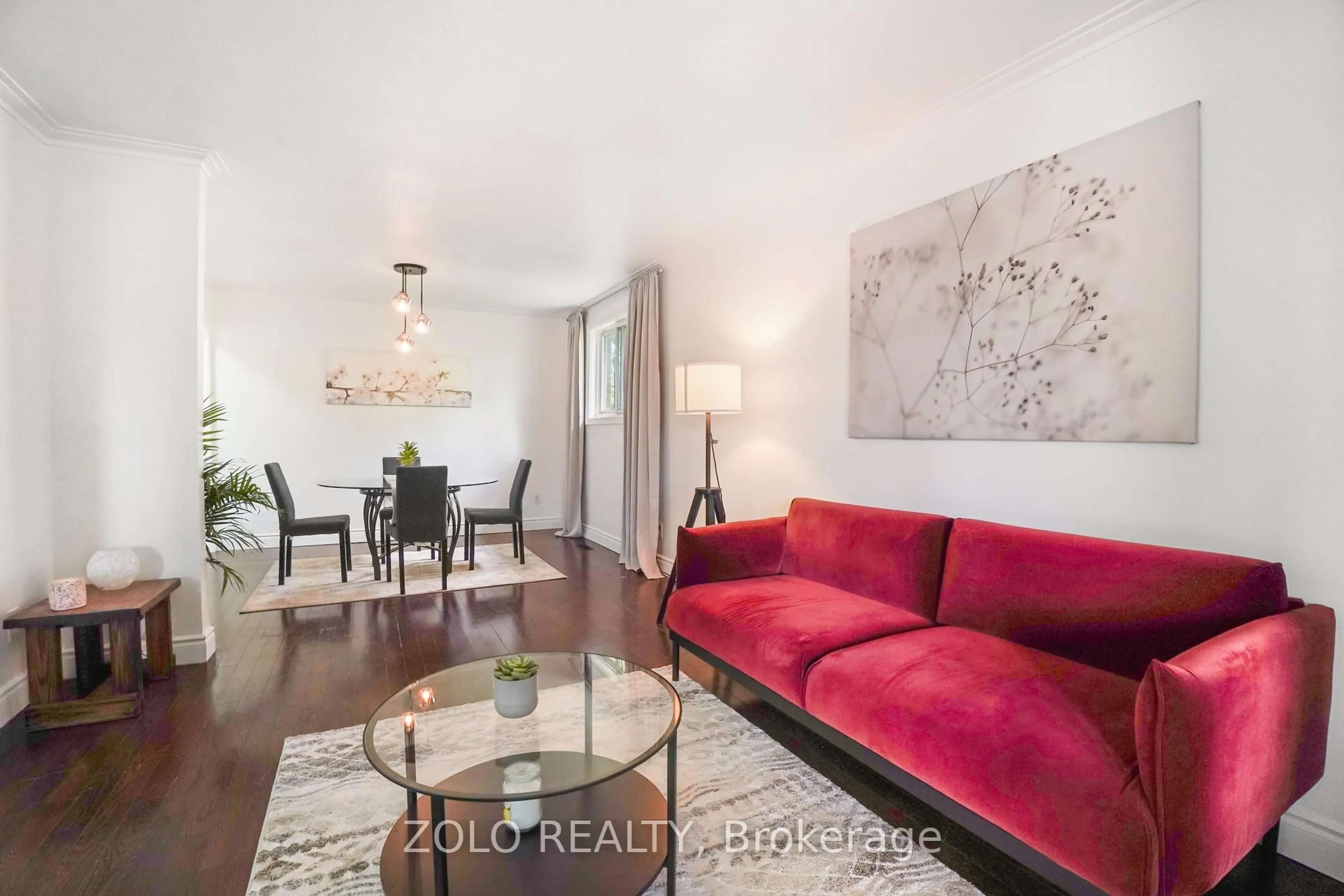Living room with furniture, wood/laminate floor for 19 Scarboro St, Mississauga Ontario L4T 1E3
