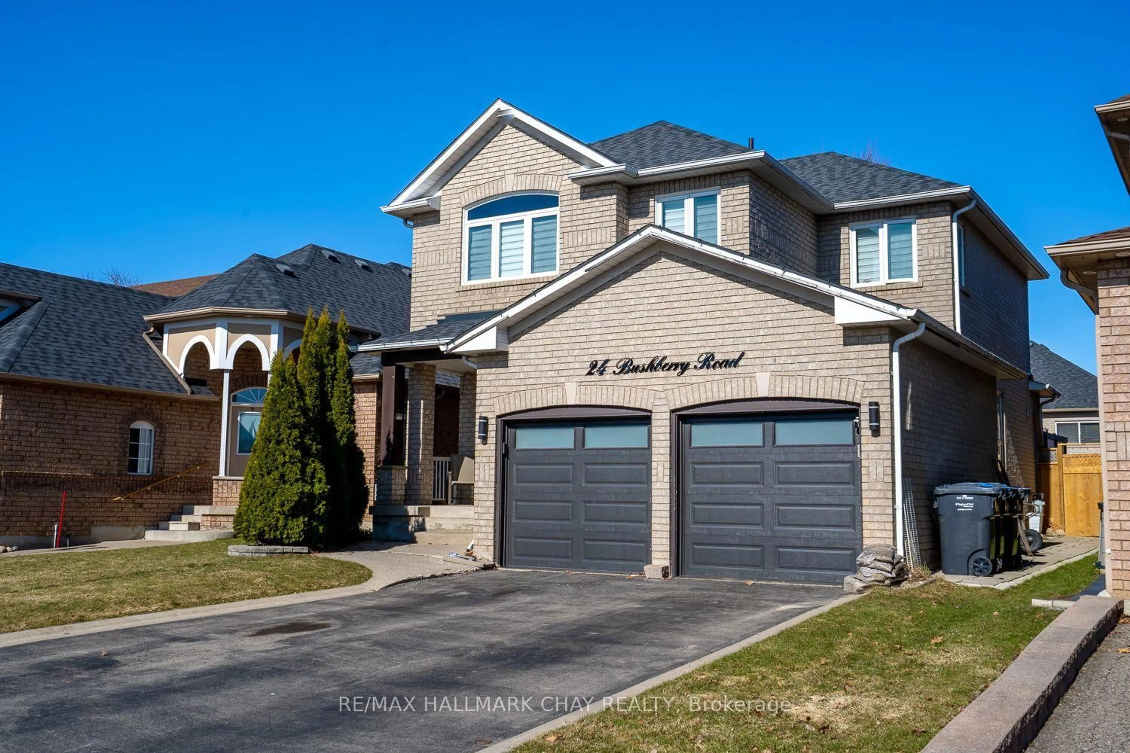 Home with brick exterior material, street for 24 Bushberry Rd, Brampton Ontario L7A 1L3