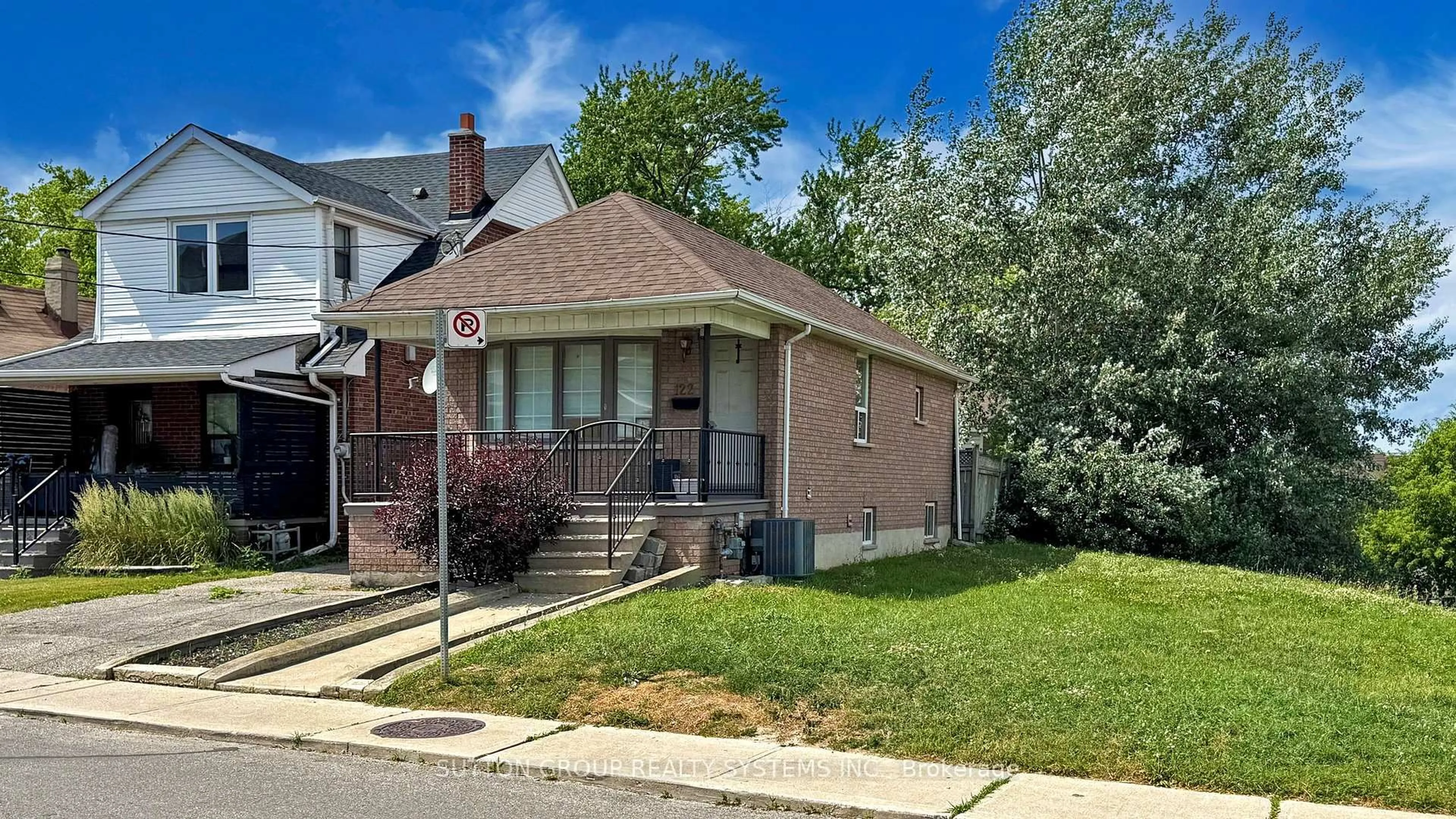 Home with brick exterior material, street for 122 Hatherley Rd, Toronto Ontario M6E 1W5