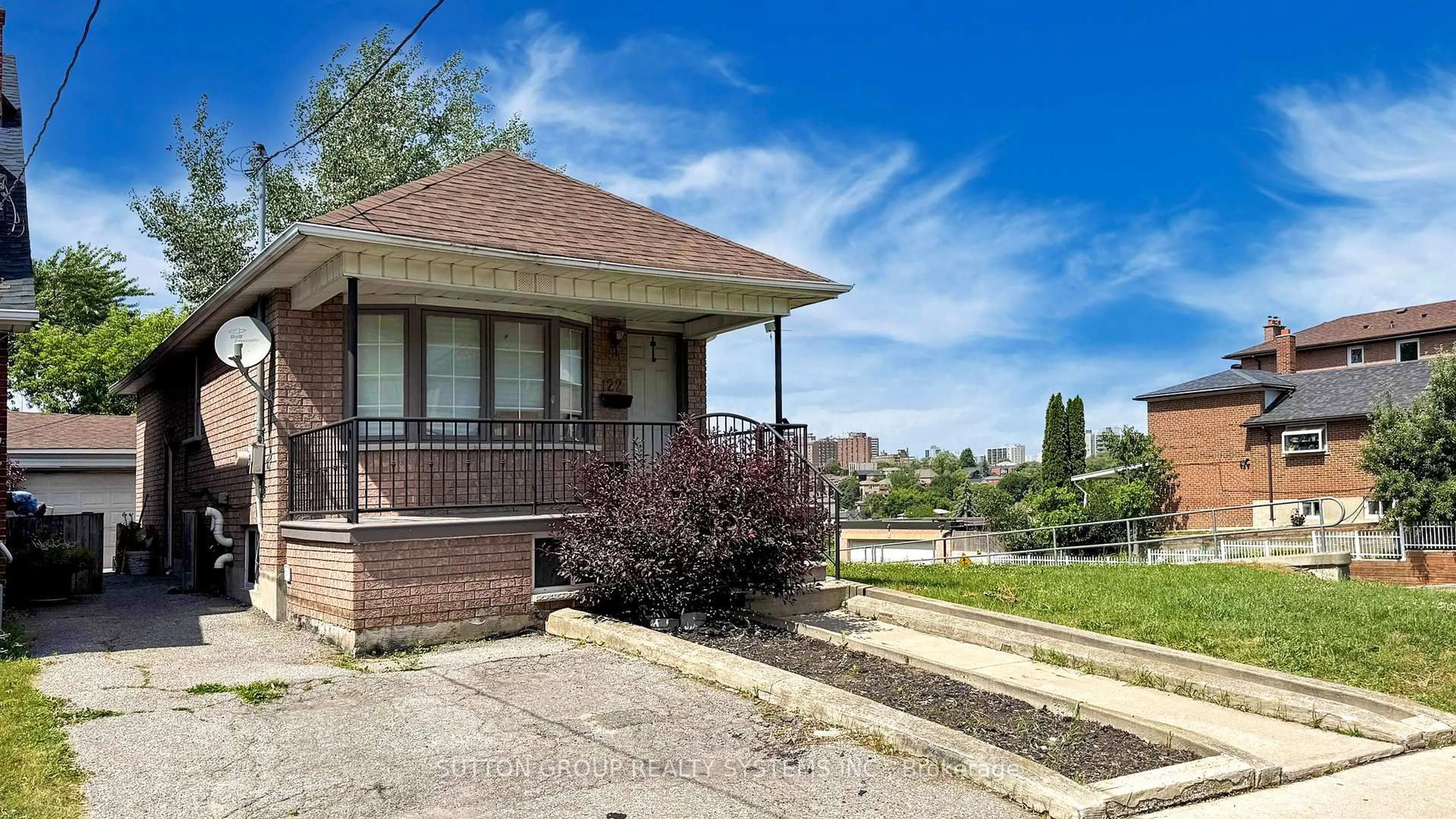 Home with brick exterior material, street for 122 Hatherley Rd, Toronto Ontario M6E 1W5