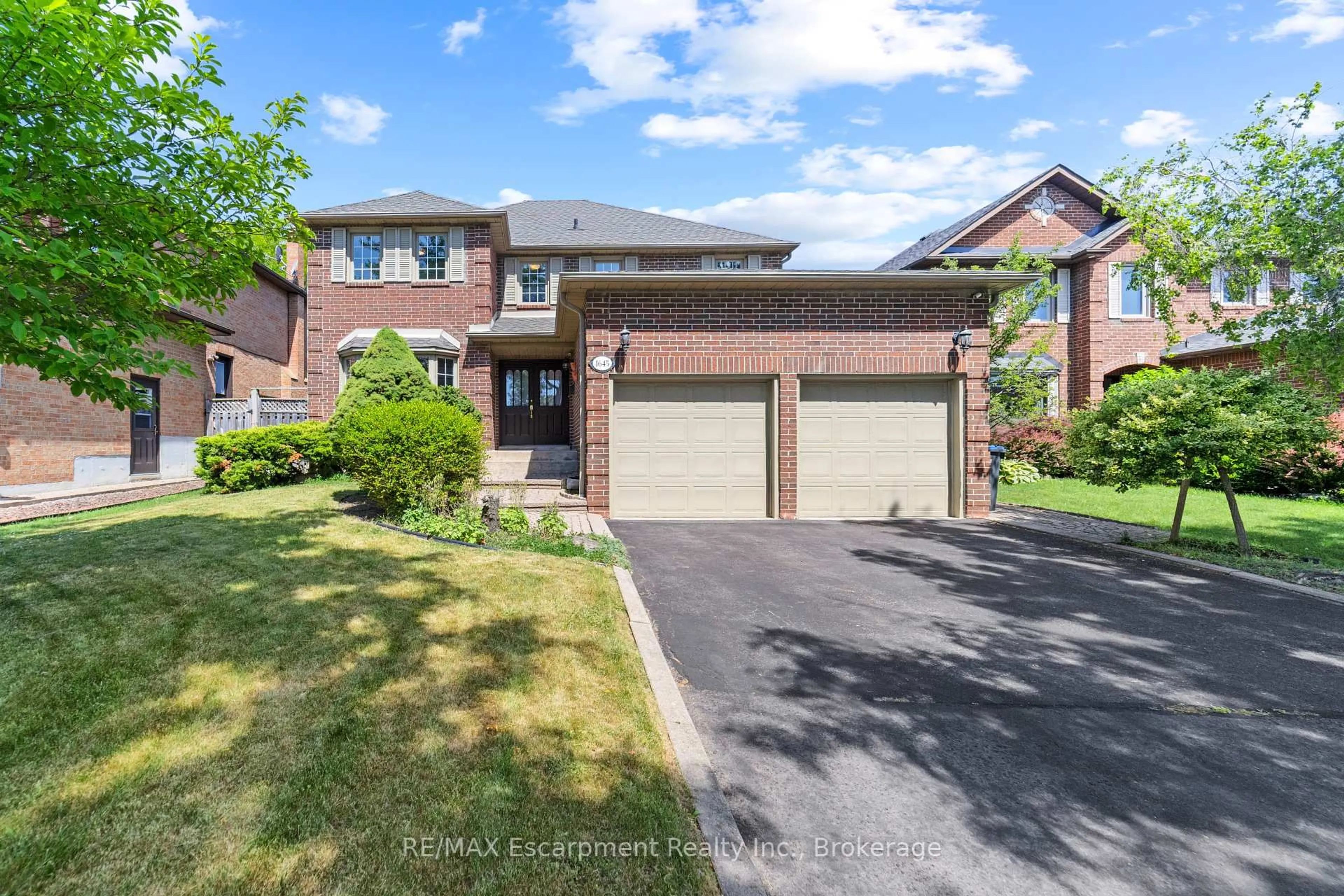 Home with brick exterior material, street for 1645 Bough Beeches Blvd, Mississauga Ontario L4W 4G5