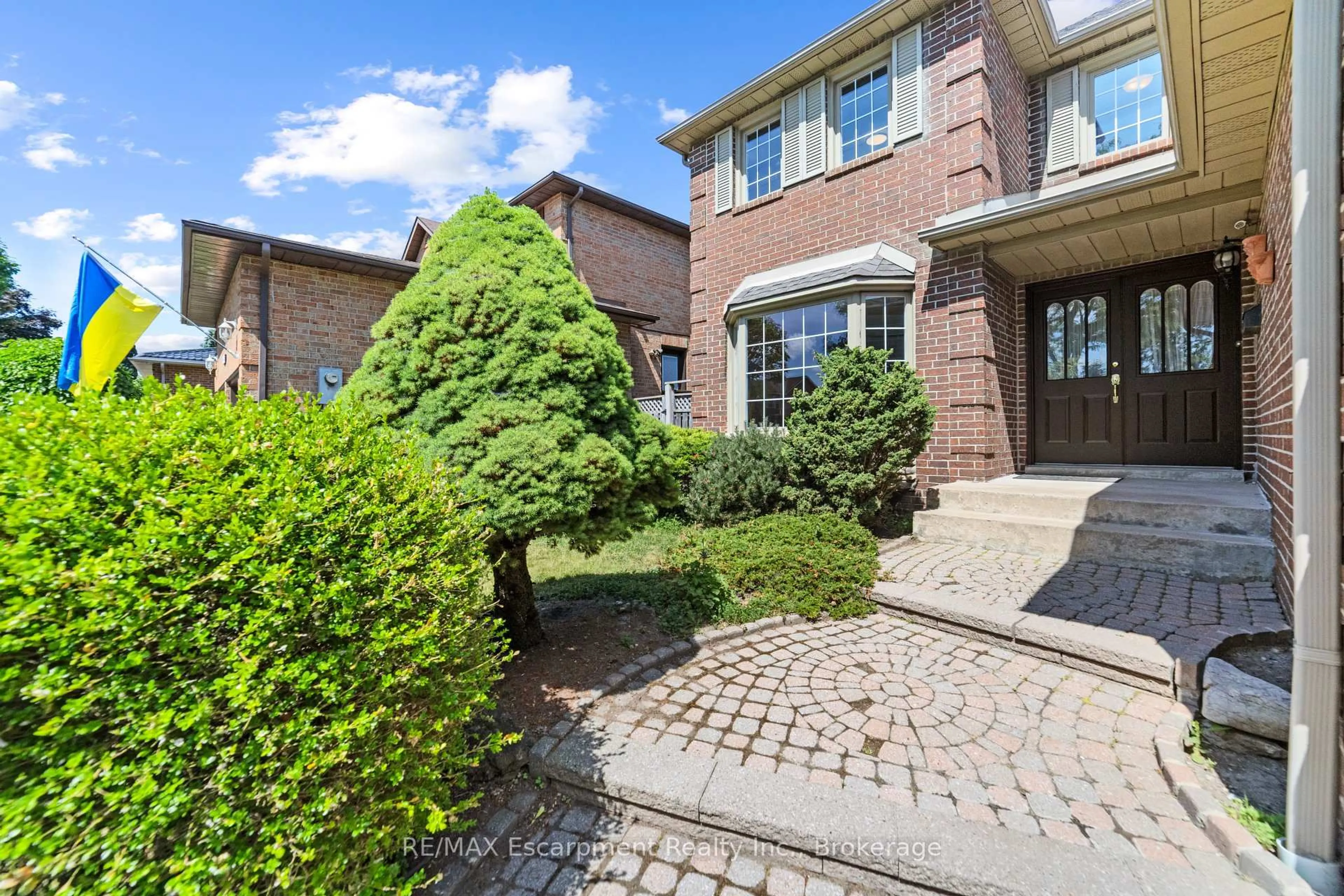 Home with brick exterior material, street for 1645 Bough Beeches Blvd, Mississauga Ontario L4W 4G5