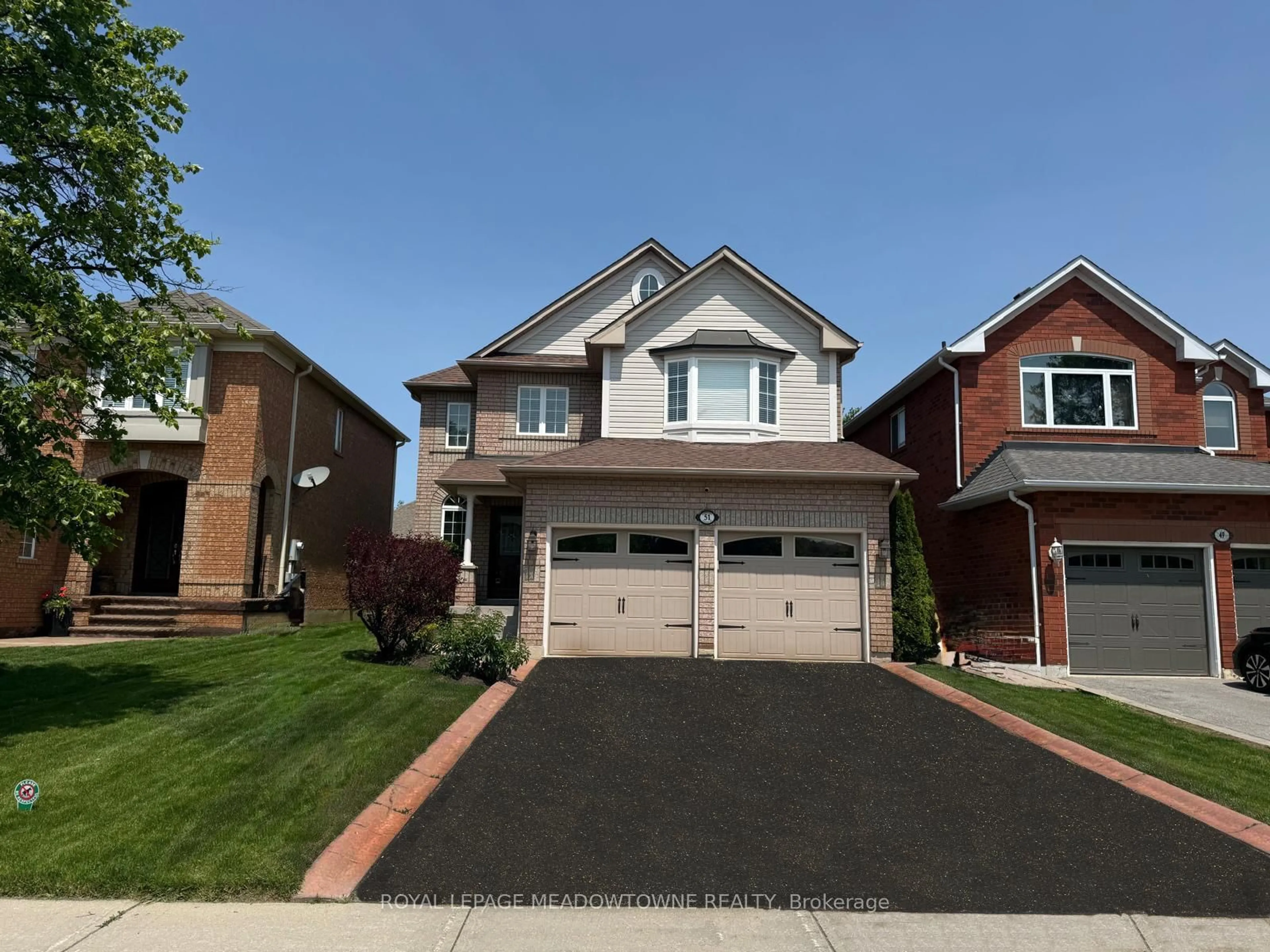 Home with brick exterior material, street for 51 Robertson Davies Dr, Brampton Ontario L7A 1K3