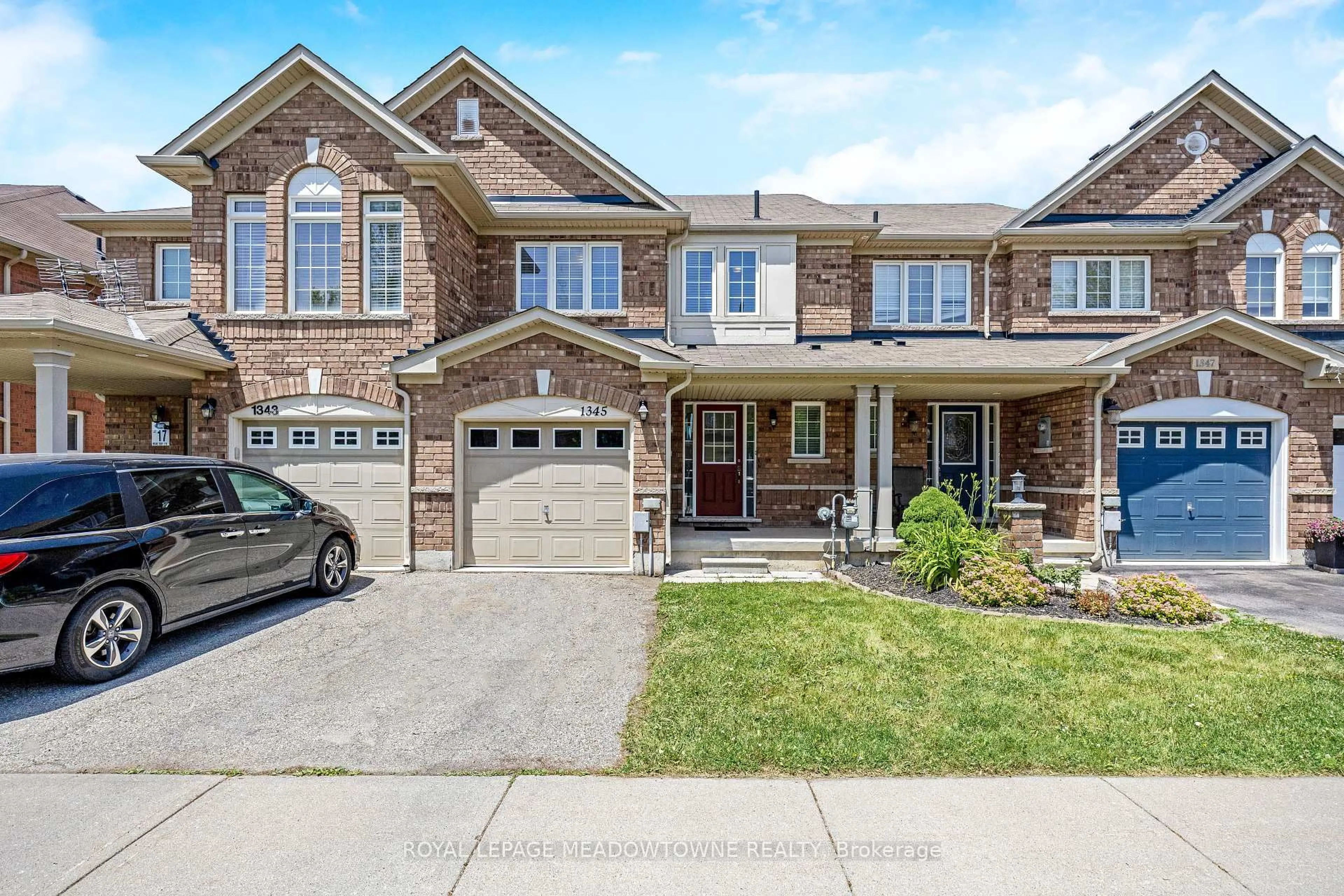 Home with brick exterior material, street for 1345 Menefy Pl, Milton Ontario L9T 7E2