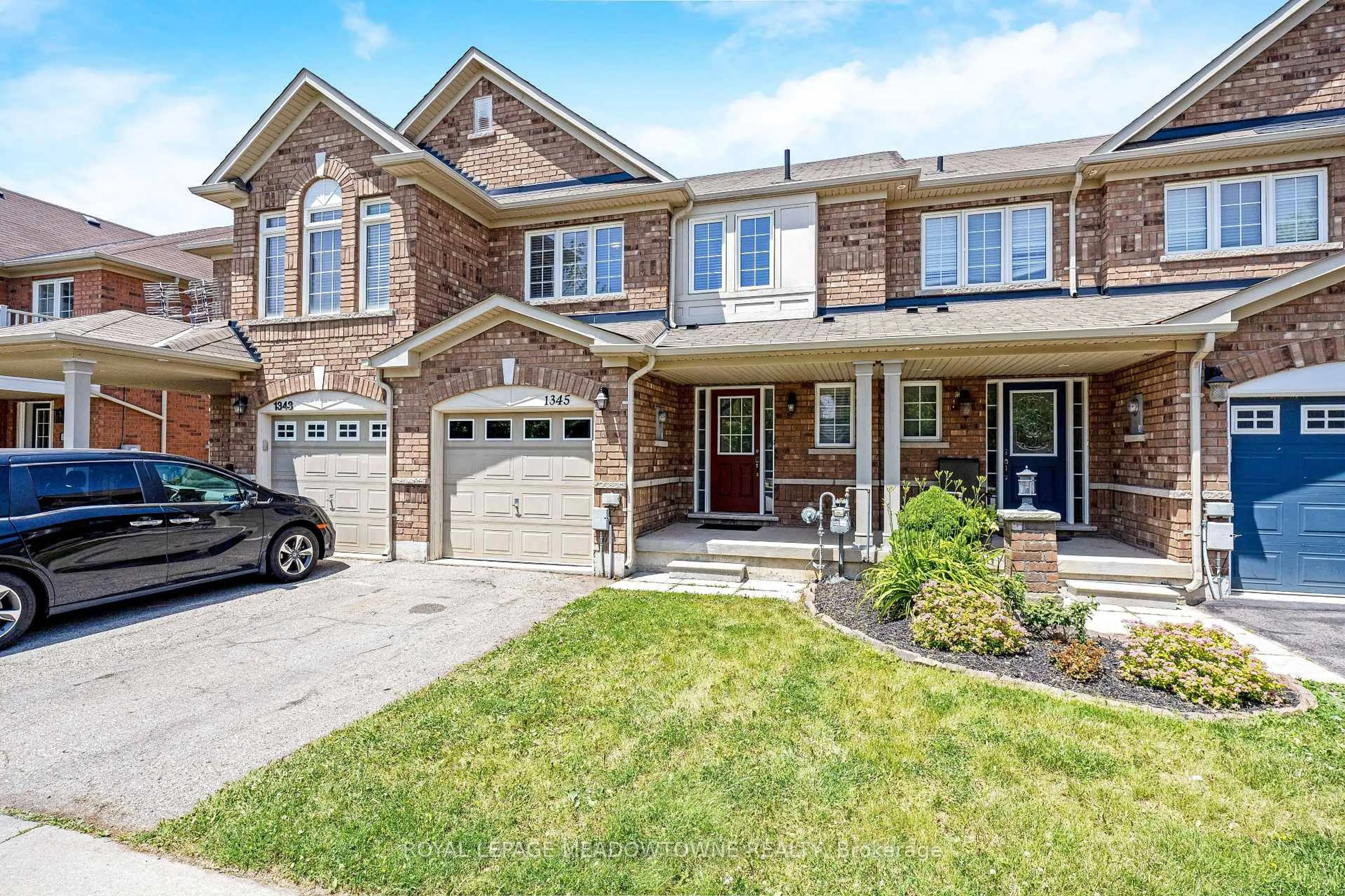 Home with brick exterior material, street for 1345 Menefy Pl, Milton Ontario L9T 7E2