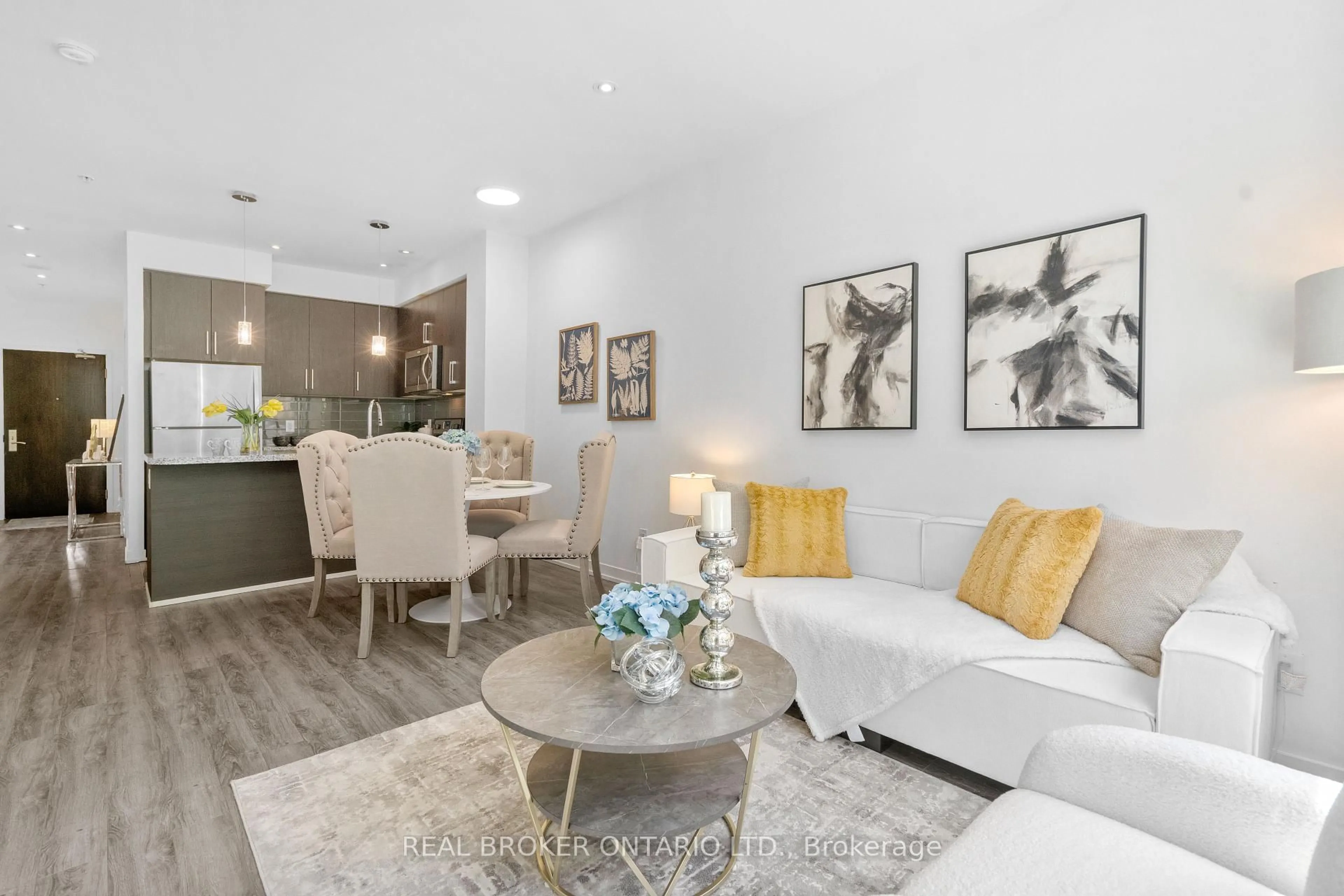 Living room with furniture, unknown for 840 Queen's Plate Dr #103, Toronto Ontario M9W 6Z3