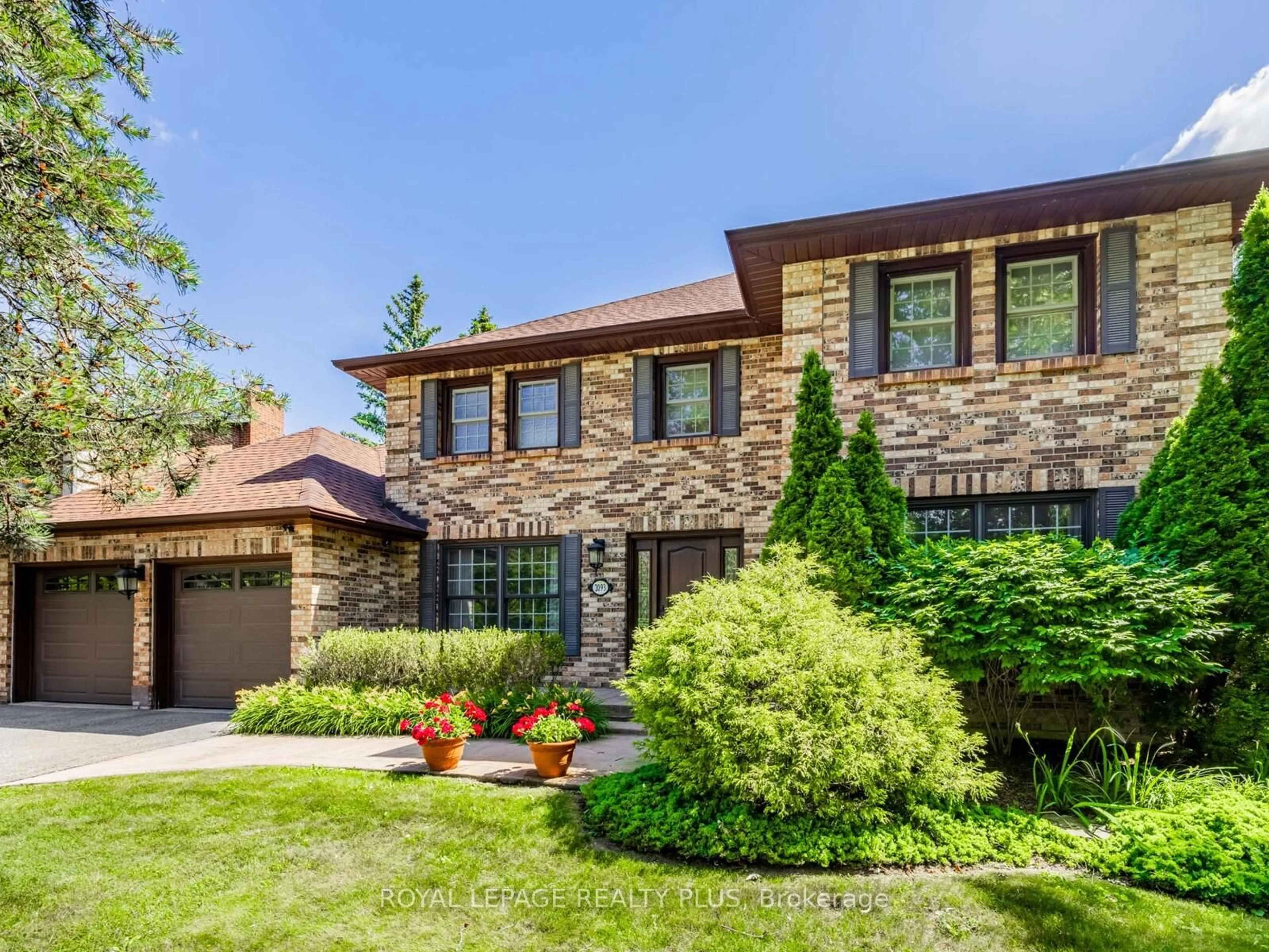 Home with brick exterior material, street for 2093 Shawanaga Tr, Mississauga Ontario L5H 3Z3