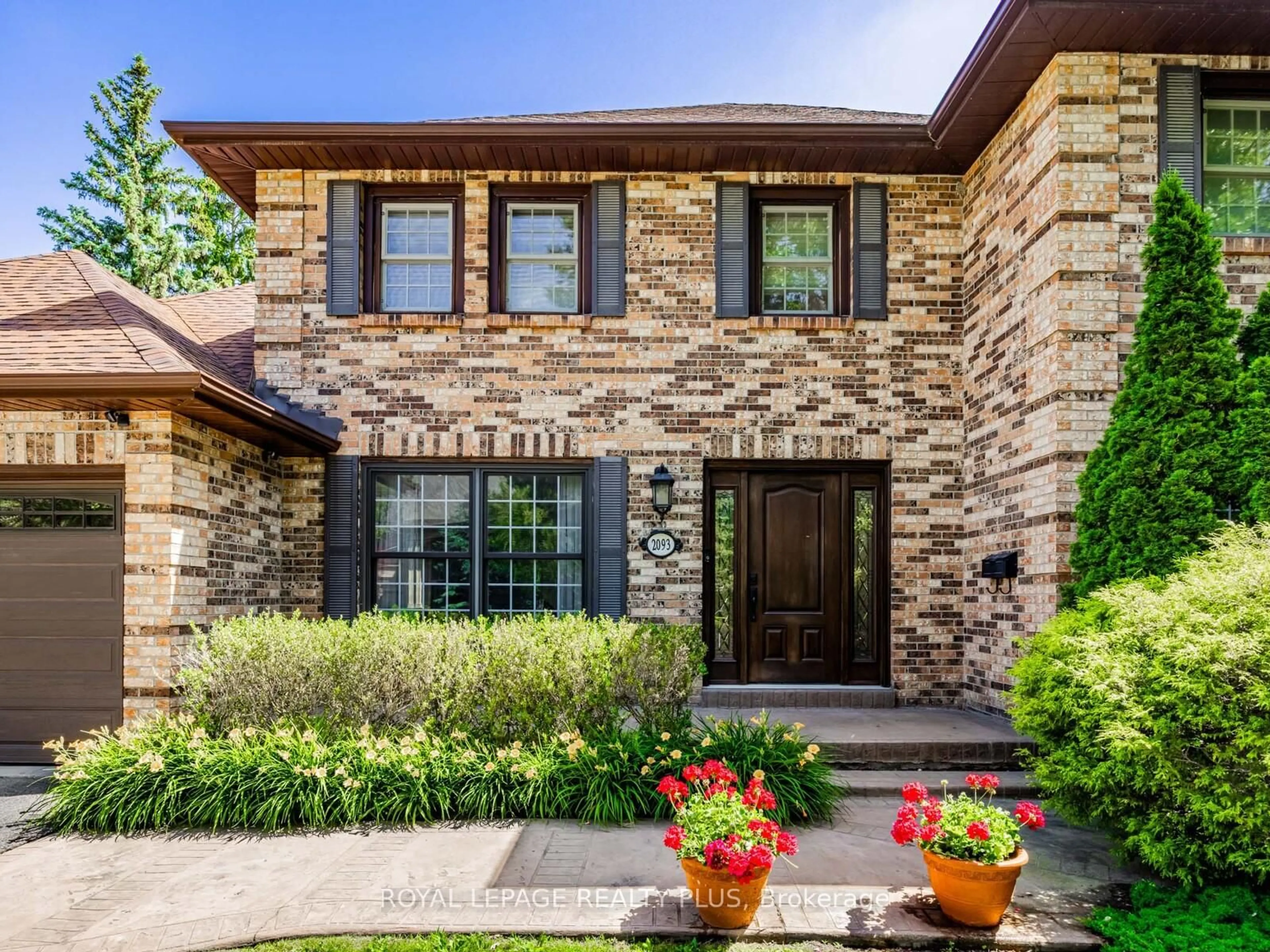 Home with brick exterior material, street for 2093 Shawanaga Tr, Mississauga Ontario L5H 3Z3