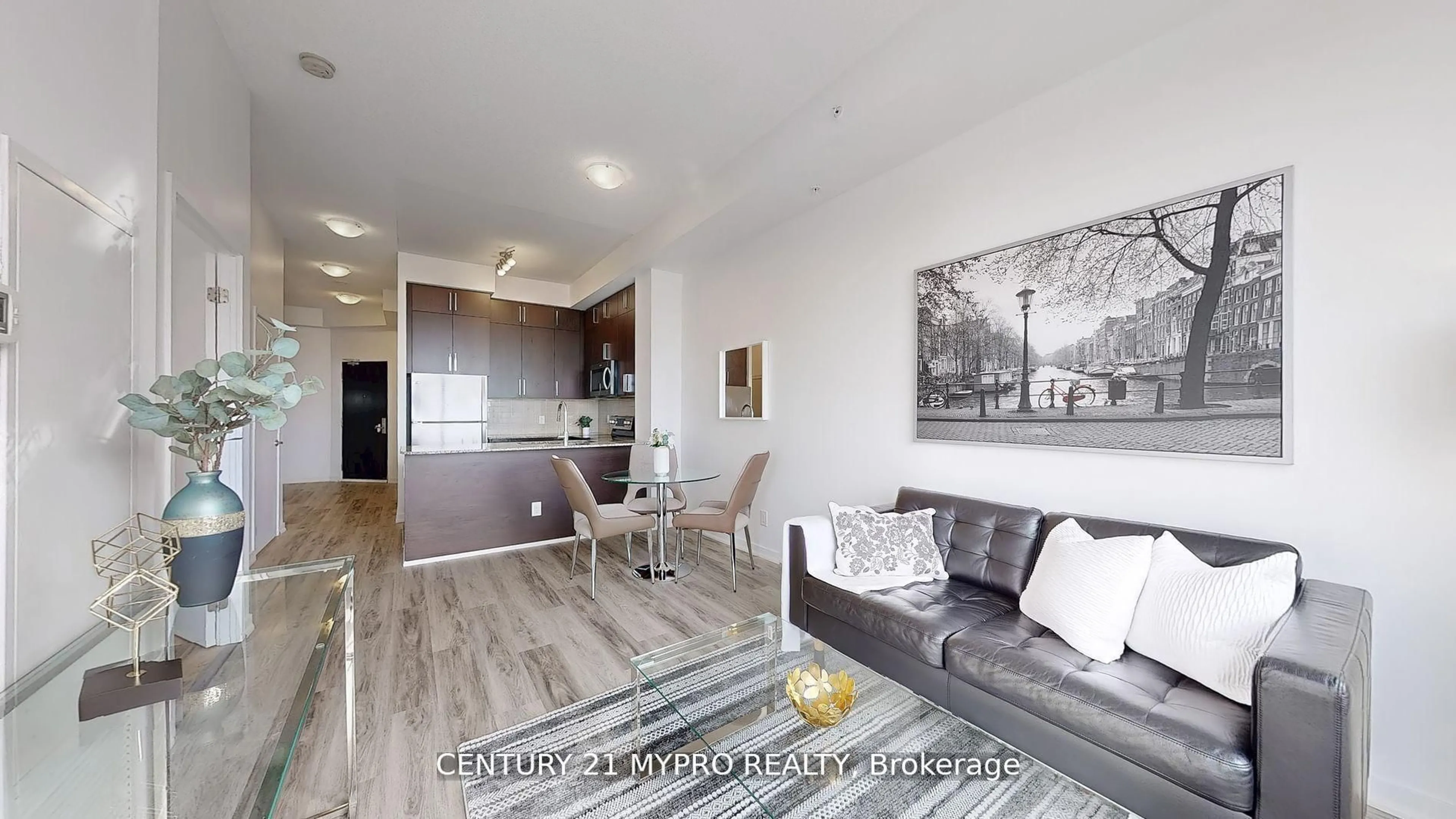 Living room with furniture, unknown for 840 Queen's Plate Dr #1003, Toronto Ontario M9W 0E7