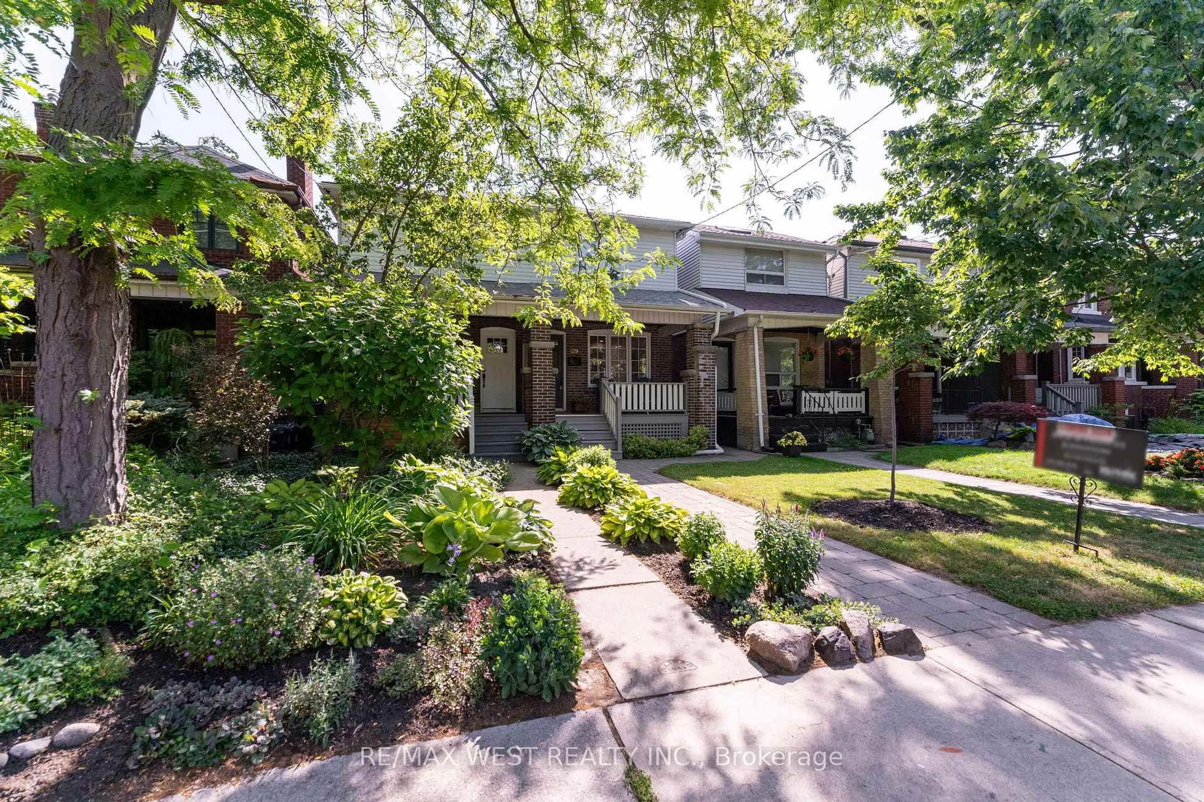 Home with brick exterior material, street for 615A Durie St, Toronto Ontario M6S 3H2