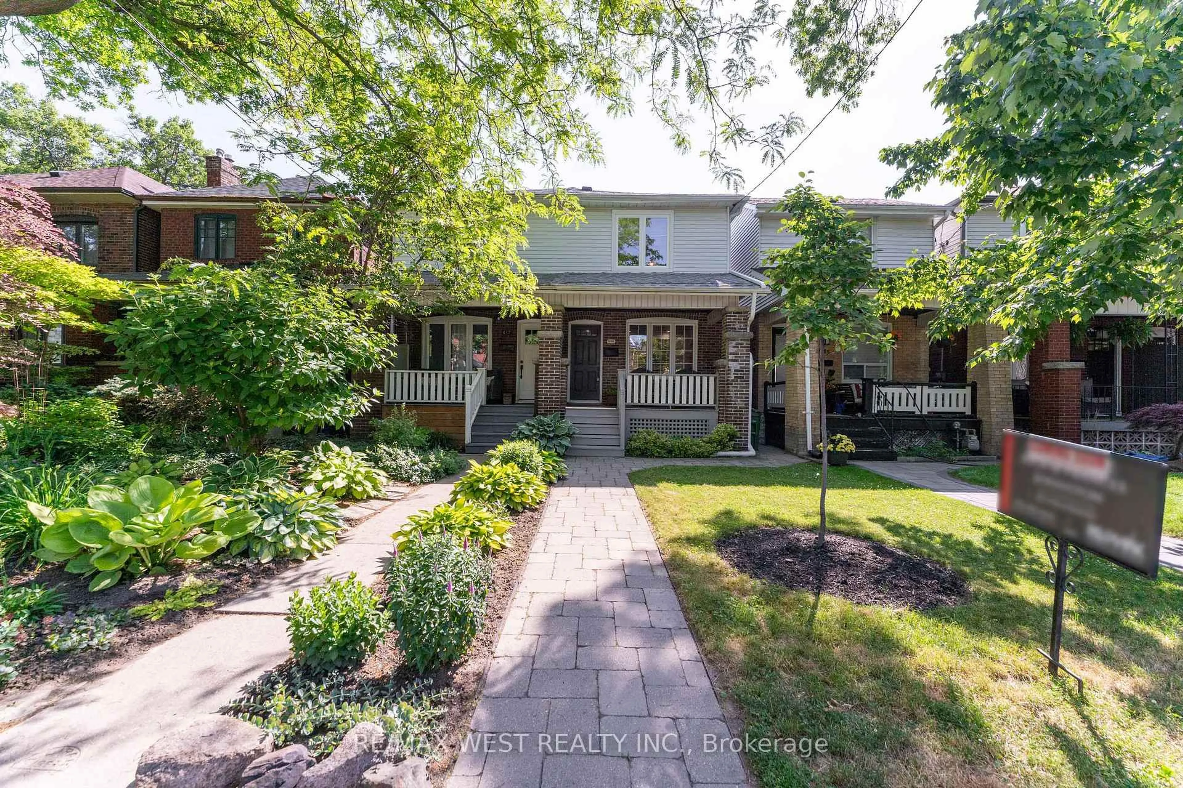 Home with brick exterior material, street for 615A Durie St, Toronto Ontario M6S 3H2