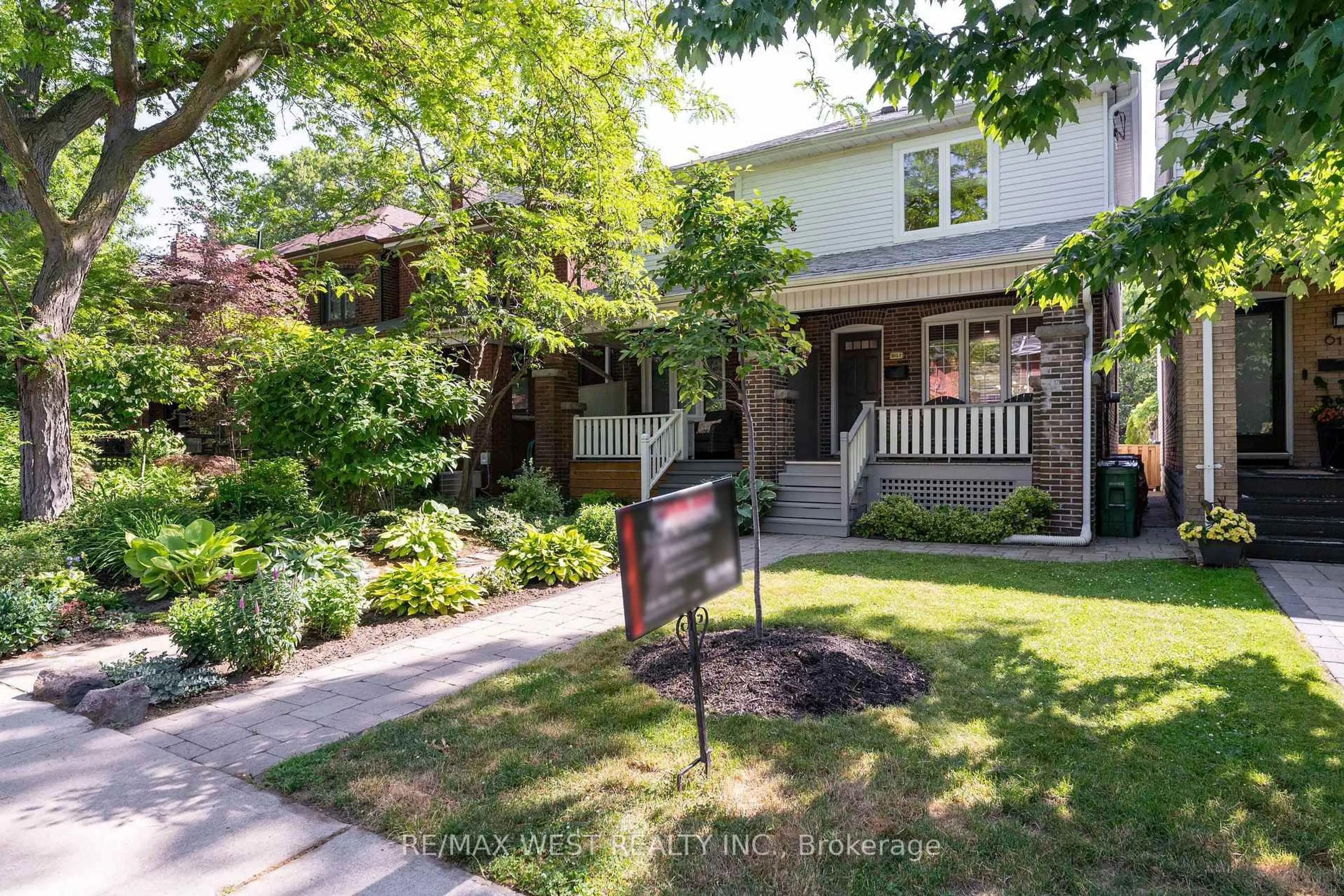 Home with brick exterior material, street for 615A Durie St, Toronto Ontario M6S 3H2