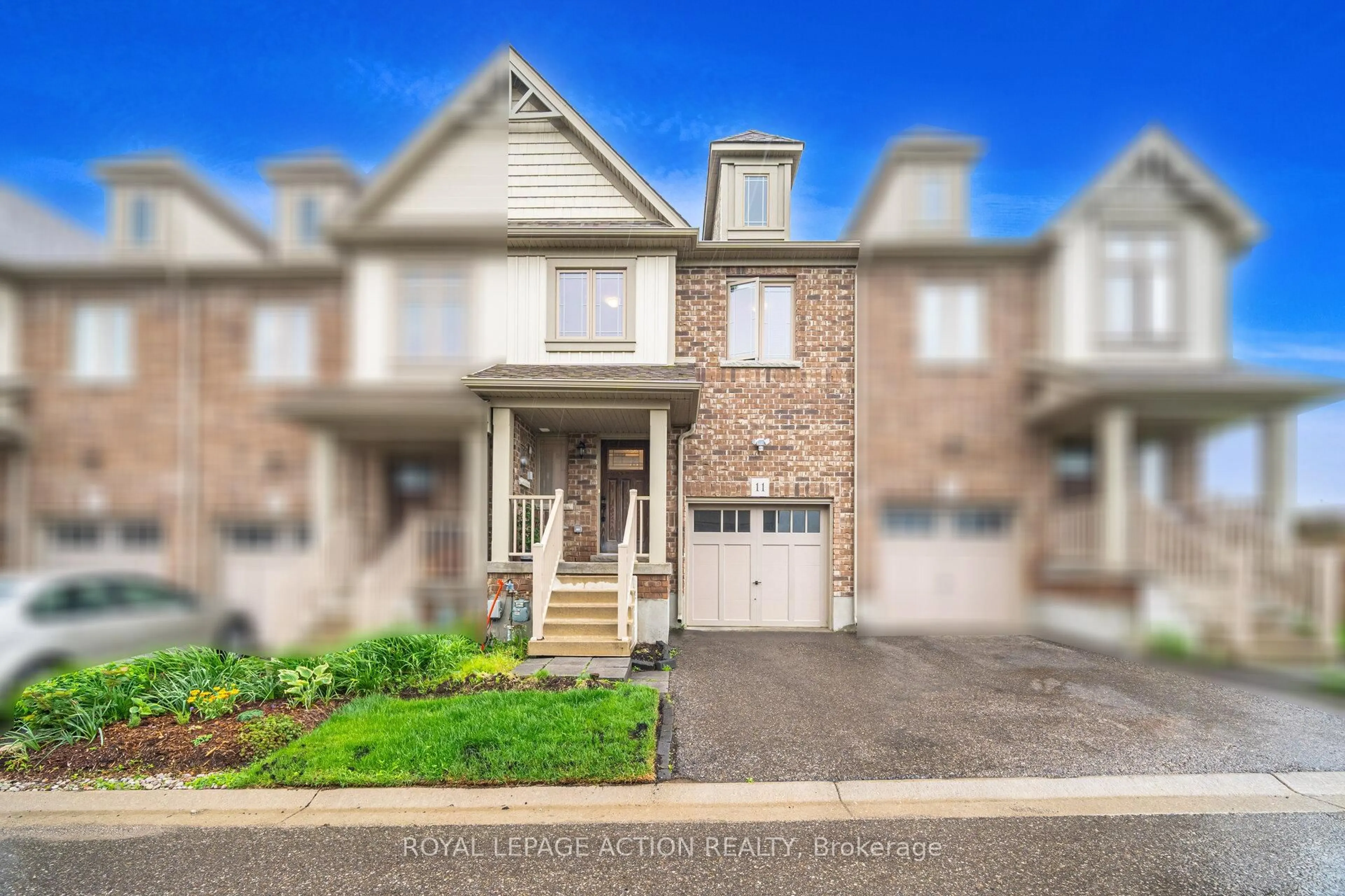 Home with brick exterior material, street for 124 Parkinson Cres #11, Orangeville Ontario L9W 6X3